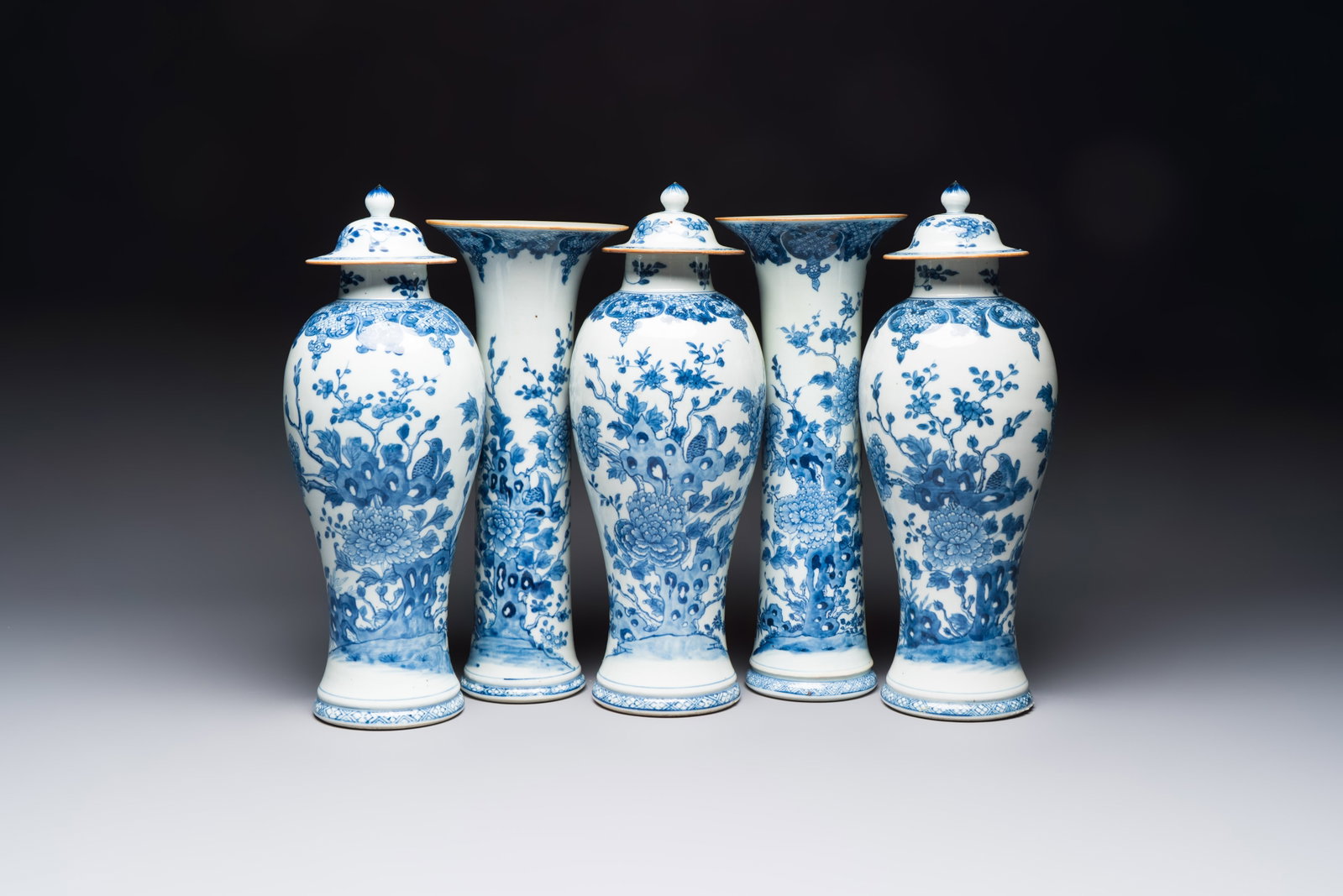 A Chinese blue and white five-piece garniture with birds among flowering branches, Qianlong (1 of 13)