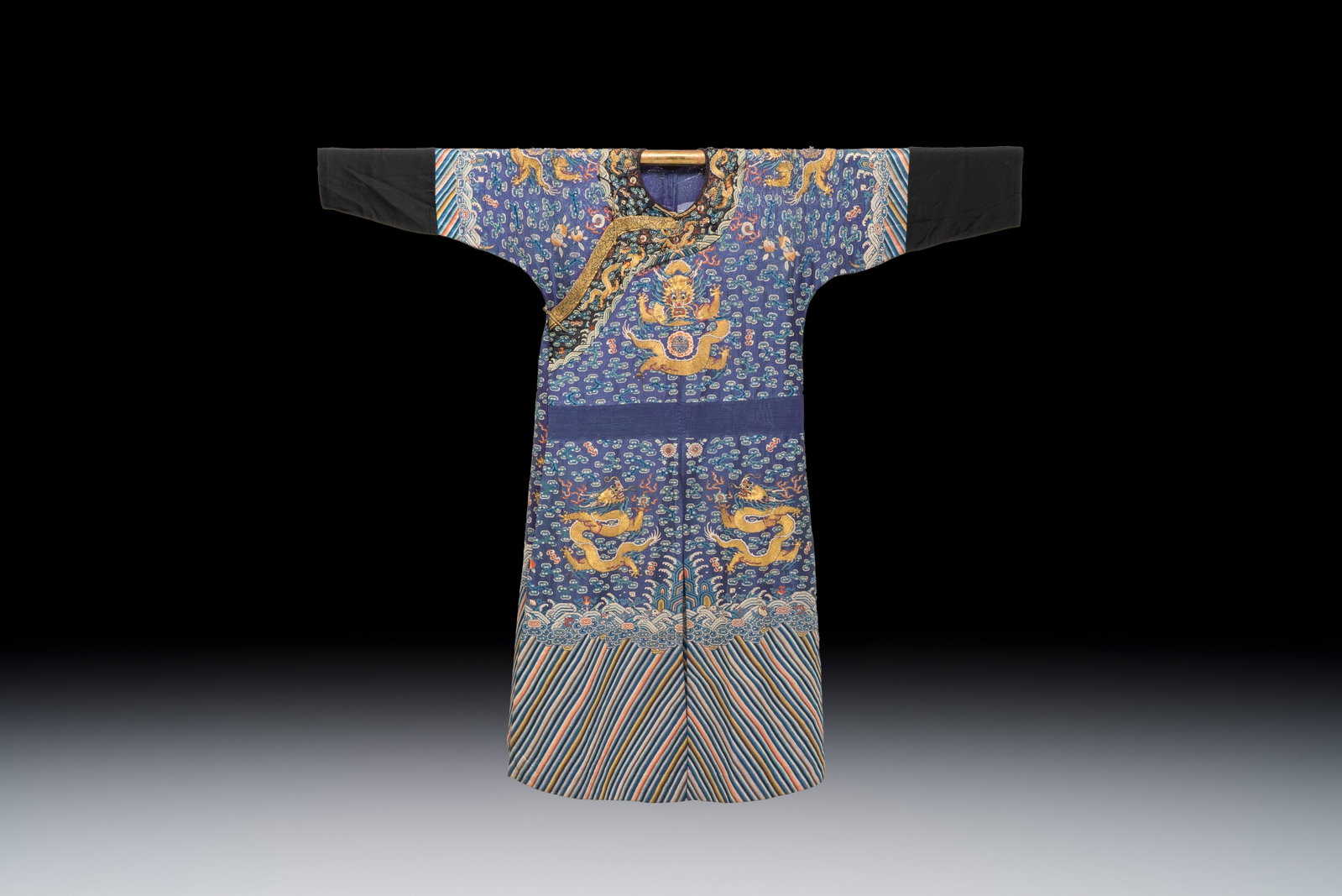 A Chinese blue-ground embroidered silk summer gauze 'Dragon' robe, 'Ji Fu', 19th C. (1 of 2)