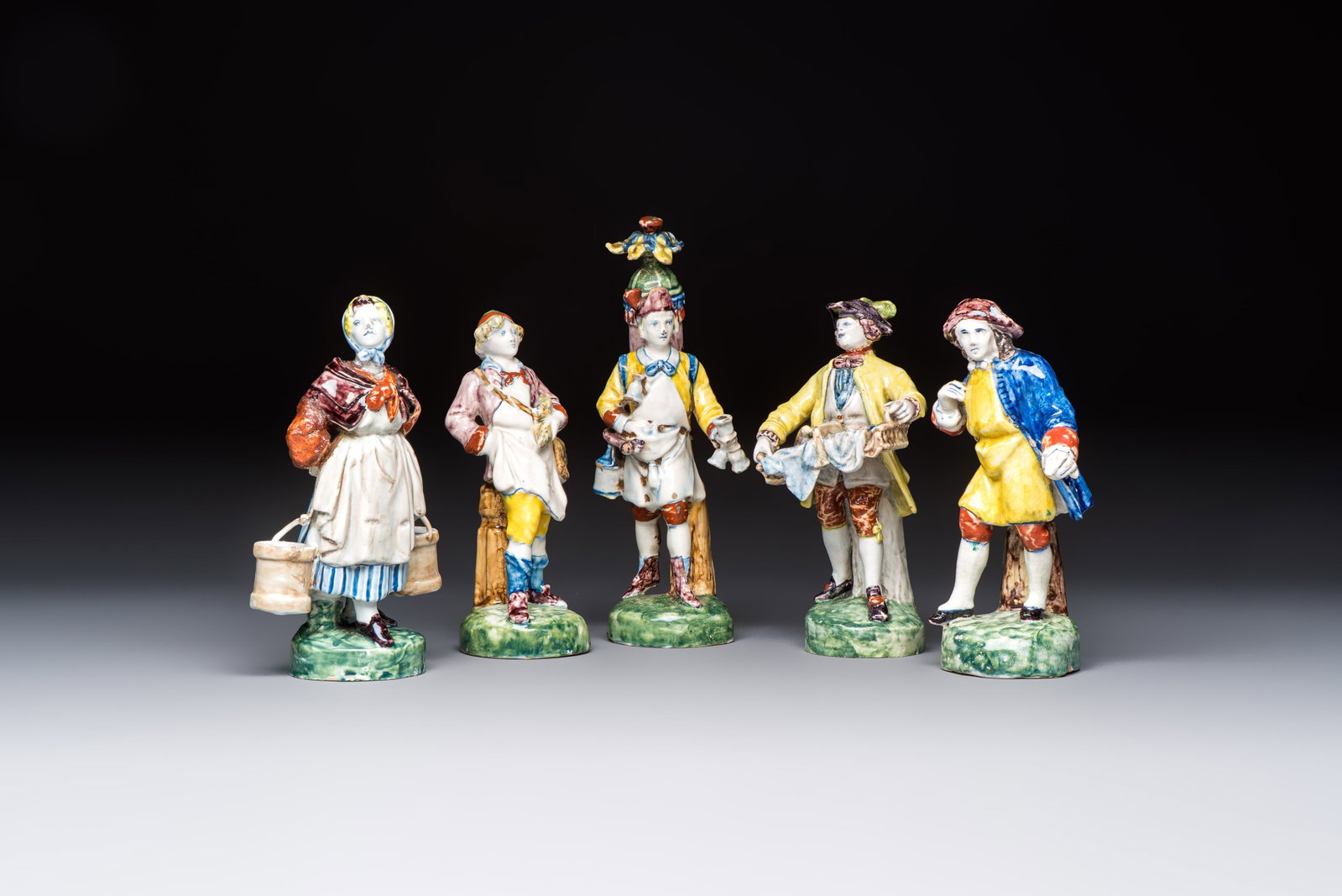 Five polychrome Delftware models of figures from everyday life, probably Desvres, France, 19th C. (1 of 7)