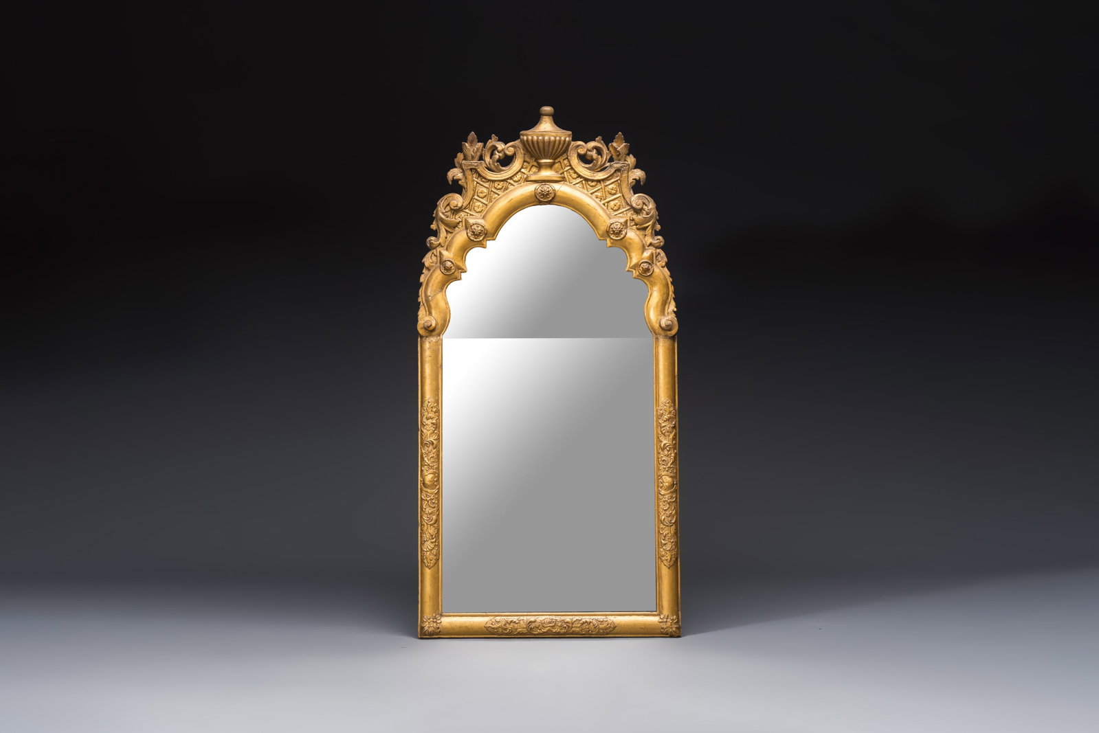 A French Louis XIV gilt-wood mirror, early 18th C. (1 of 2)