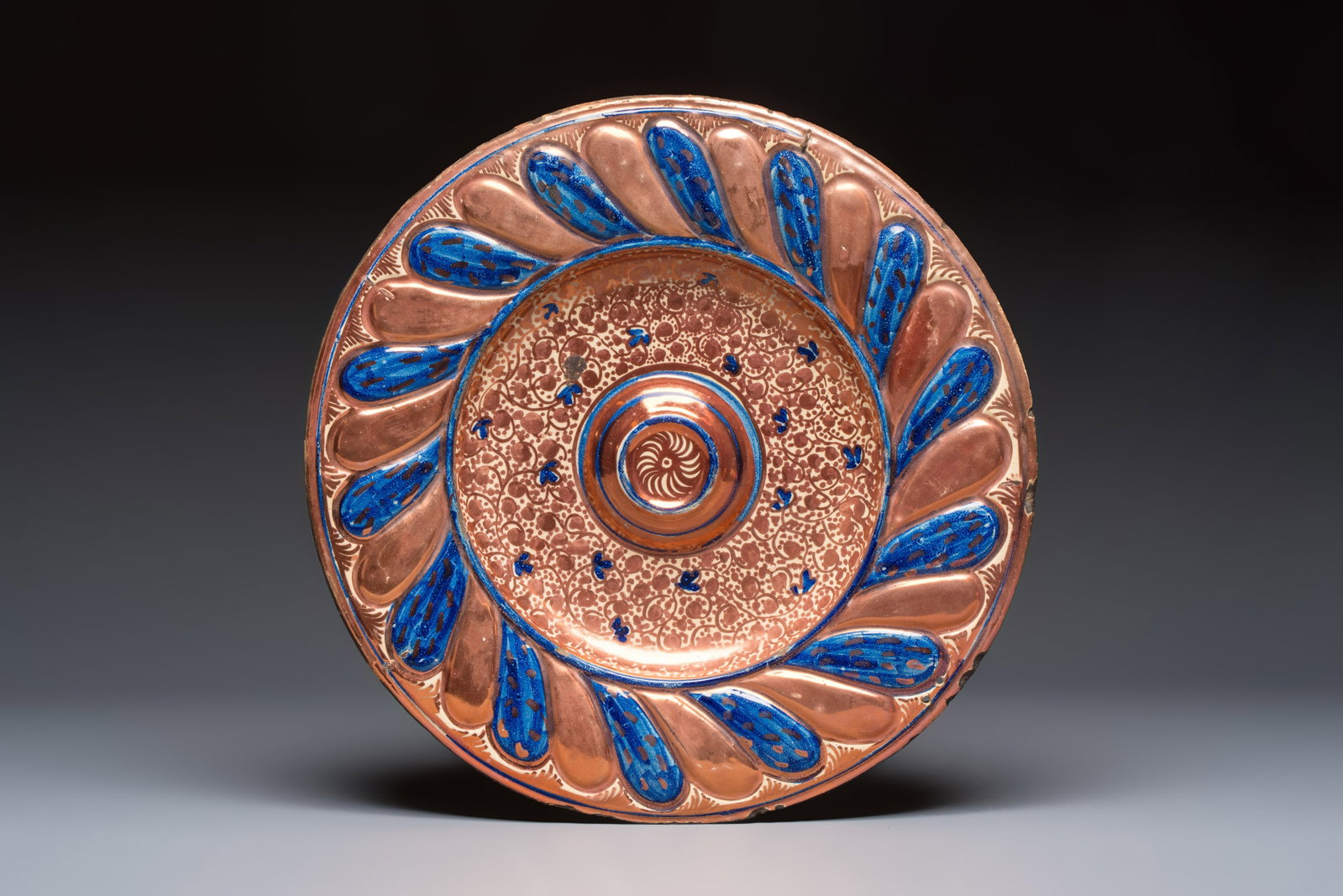 A large Hispano-Moresque lustre-glazed dish, Spain, 19th C. (1 of 2)
