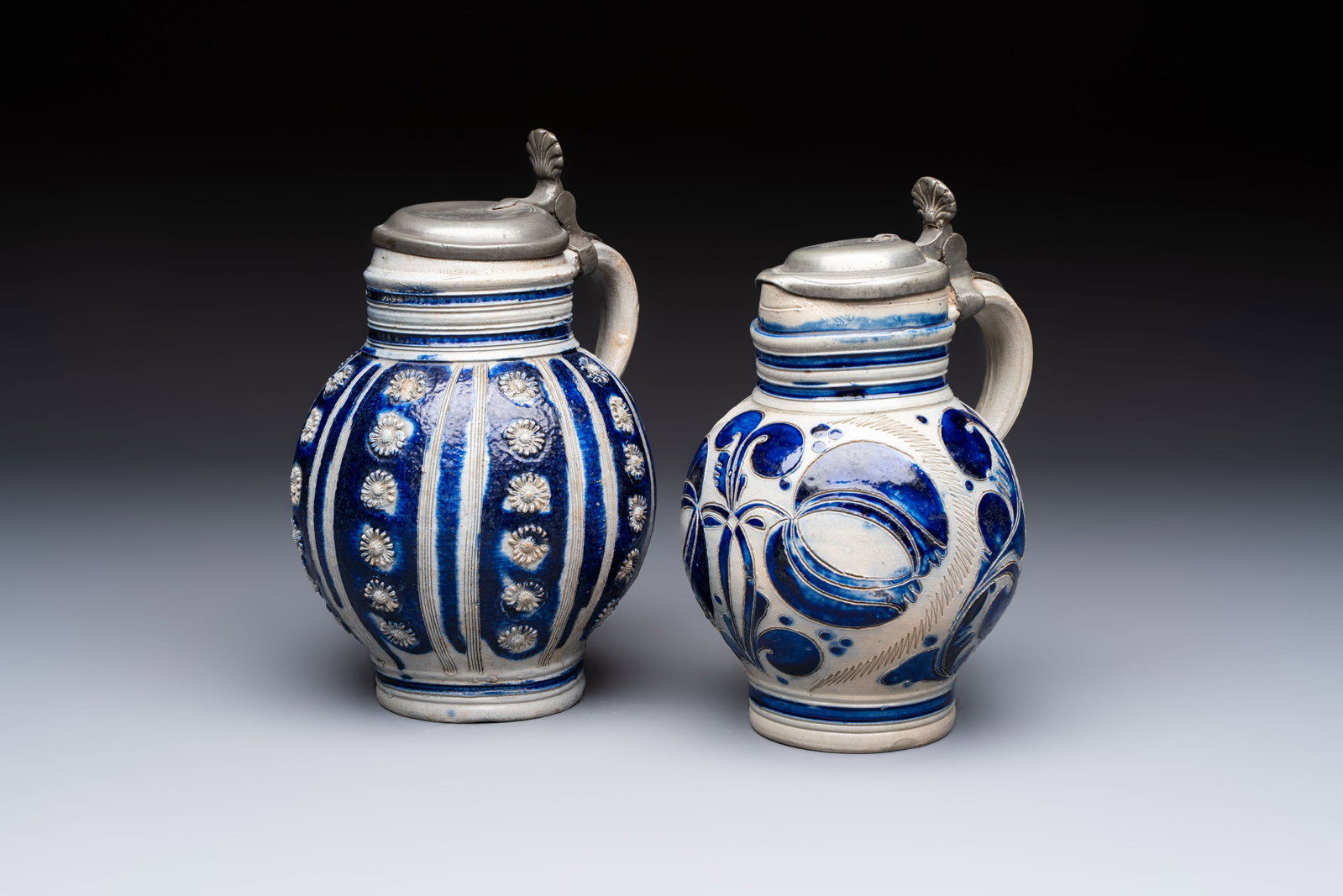 Two Westerwald tankards with mounted pewter lids, one lid dated 1757, Germany, 18th C. (1 of 7)