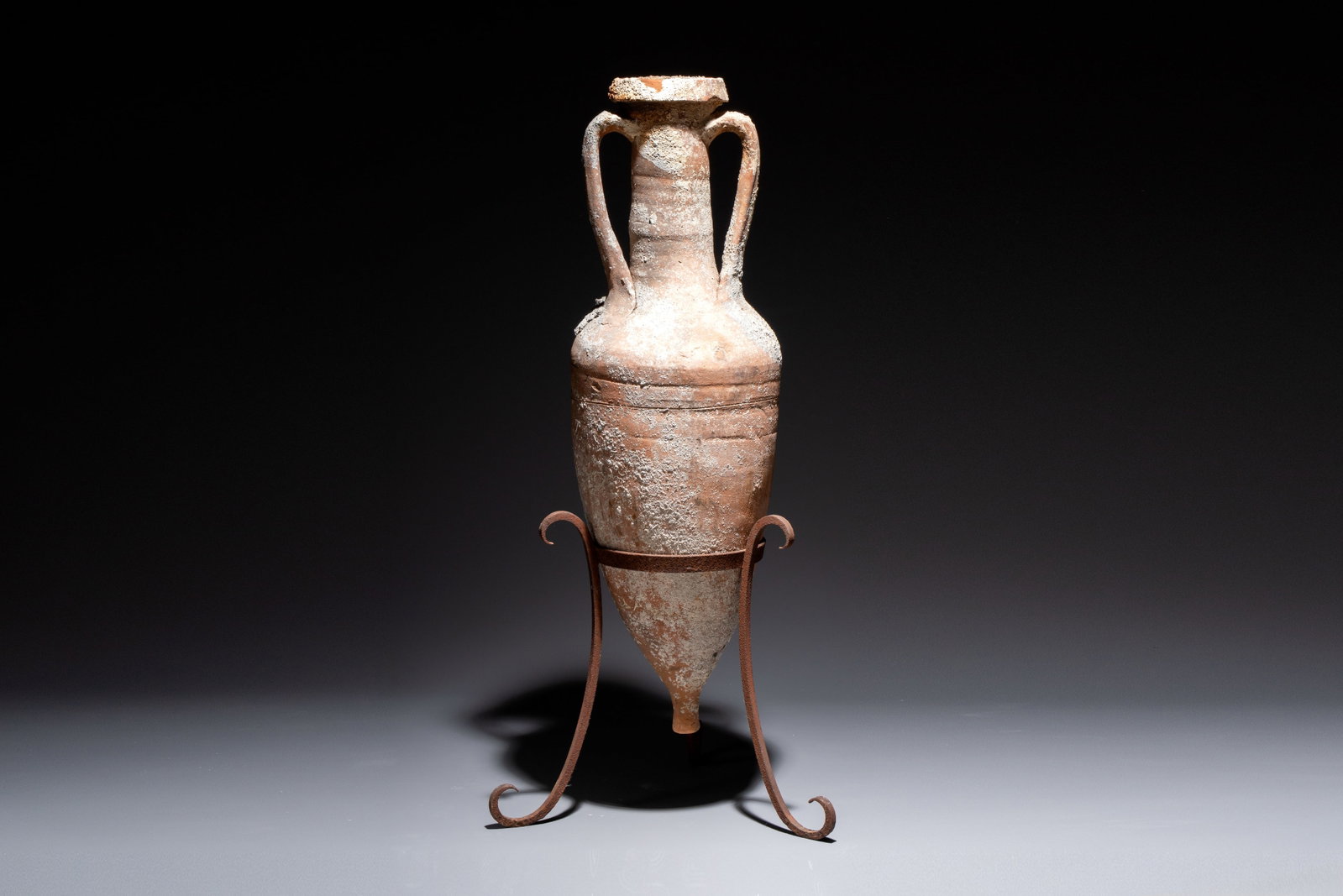 A Roman pottery wine transport amphora with marine encrustation, 2nd C. B.C./1st C. (1 of 9)
