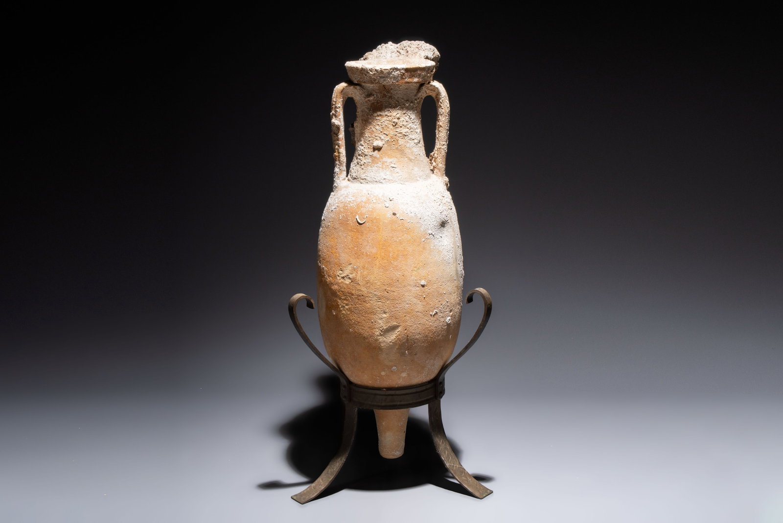 A Roman pottery fish oil or wine transport amphora with marine encrustation, South of Spain, 1st C. (1 of 9)