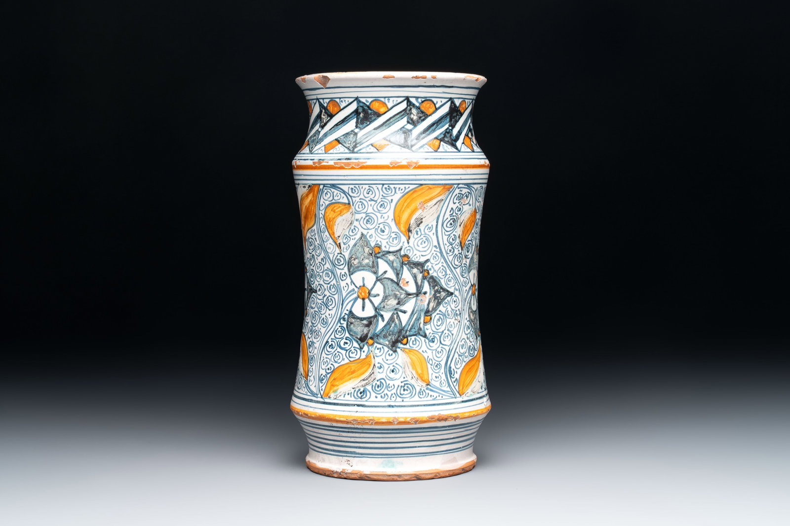 A polychrome Italian albarello with stylised floral design, 19th C. (1 of 6)