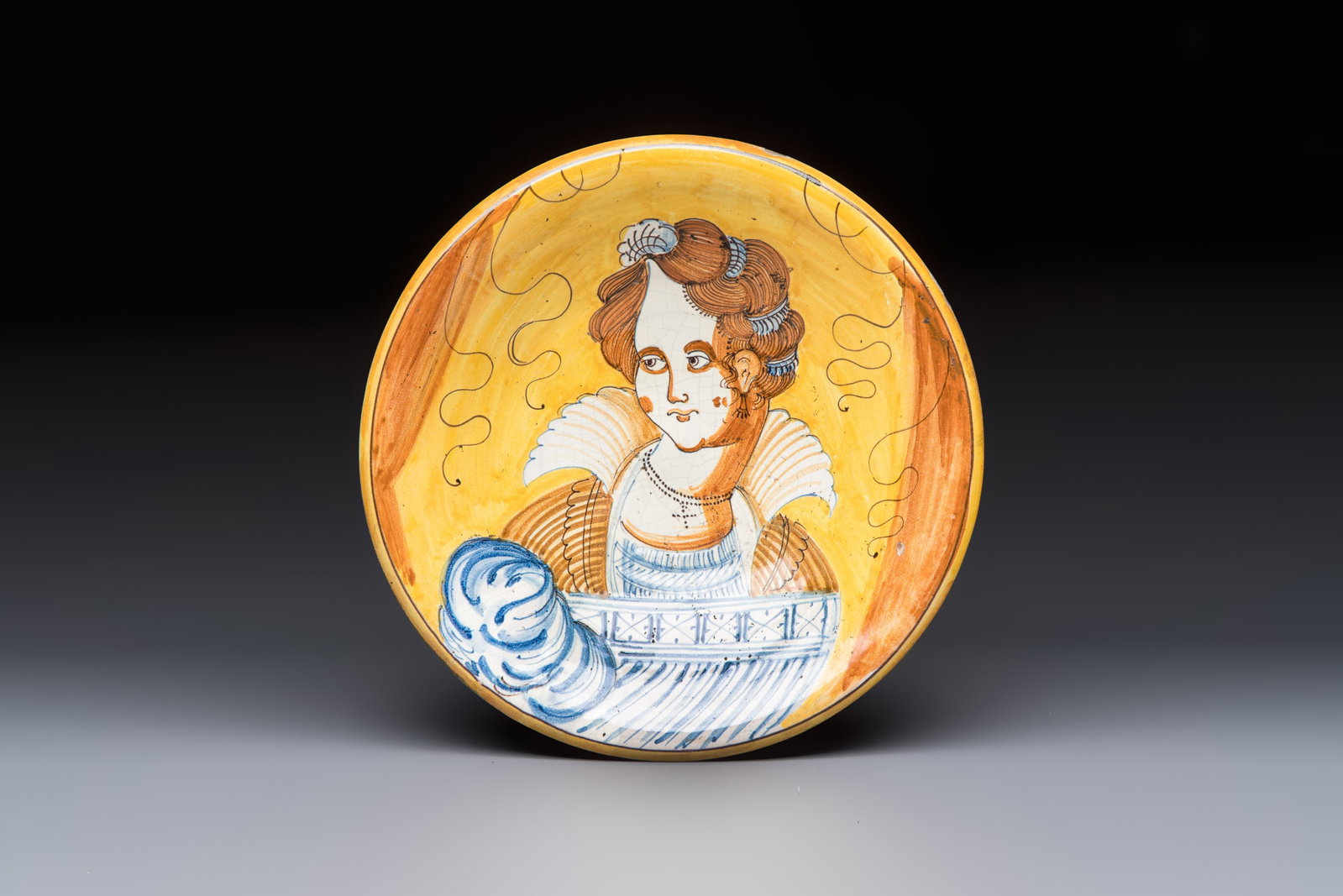An Italian maiolica 'Portrait' dish, Montelupo, 17th C. (1 of 2)