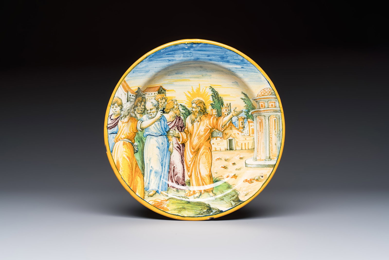A polychrome Italian maiolica dish with Christ opposite the Temple on the Mount of Olives, Rimini, (1 of 2)