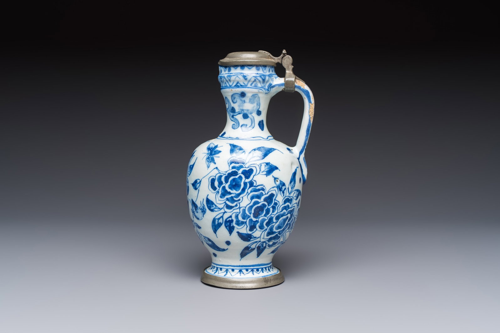 A blue and white pewter-mounted Delftware chinoiserie ewer, probably London, 17th C. (1 of 8)