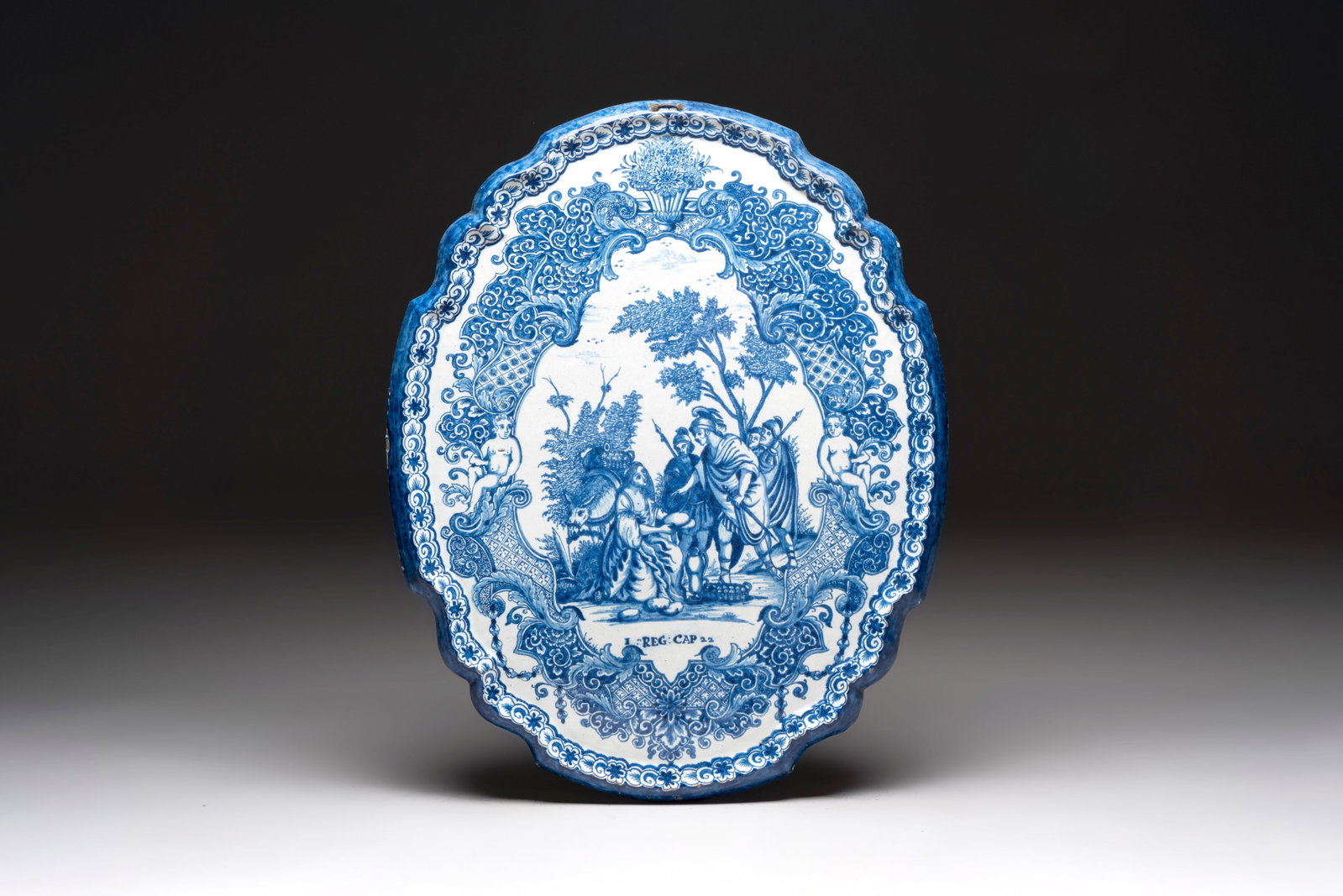 A large blue and white Dutch Delft plaque with the biblical scene of Abigail and David, 18th C.: A large blue and white Dutch Delft plaque with the biblical scene of Abigail and David, 18th C. Dim.: 55 x 44,5 cm The plaque depicts the biblical scene of Abigail presenting provisions to David, illu