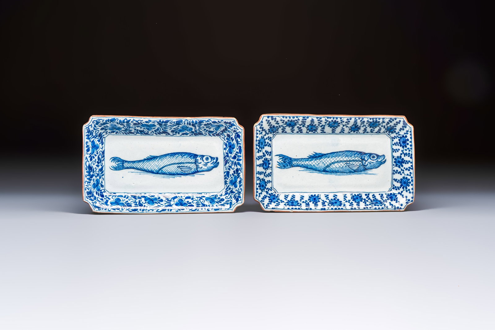 Two blue and white Dutch Delft 'Herring' dishes, 18th C.: Two blue and white Dutch Delft 'Herring' dishes, 18th C. Dim.: 22 x 13,5 cm Both marked'CK'above a numeral 53 on the base for Cornelis Koppens, the 'De Metaale Pot' workshop, Delft, 1724-1757. One als
