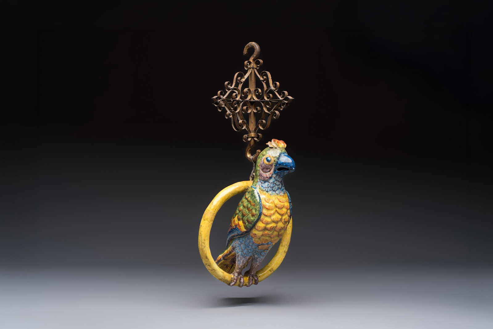 A polychrome Dutch Delft model of a parrot with gilt bronze hanging ornament, 18/19th C. (1 of 8)
