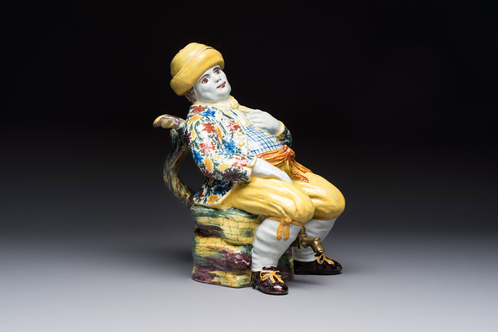 A polychrome Dutch Delft 'Bobbejak' table fountain and cover, 18th C. (1 of 7)