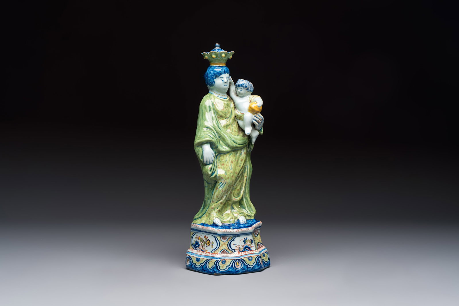 A polychrome Dutch Delft model of the Virgin with Child, 18th C. (1 of 9)