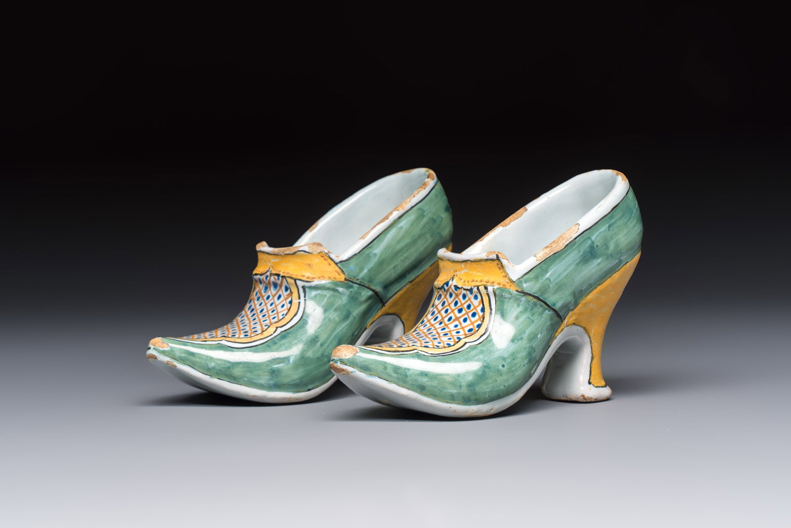 A pair of polychrome Dutch Delft models of shoes, 18th C. (1 of 7)