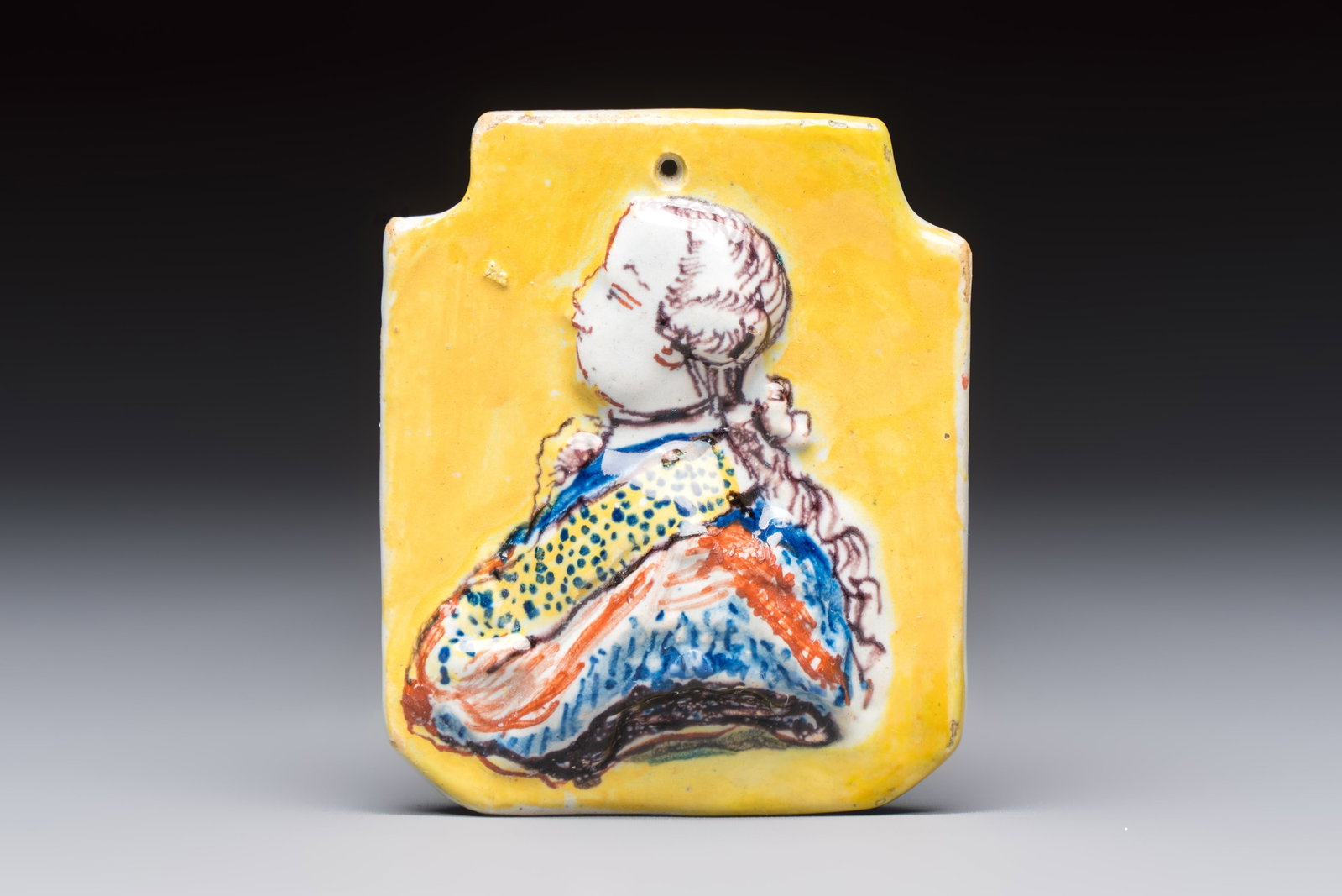 An extremely rare polychrome molded Dutch Delft orangist portrait plaque, 18th C. (1 of 2)
