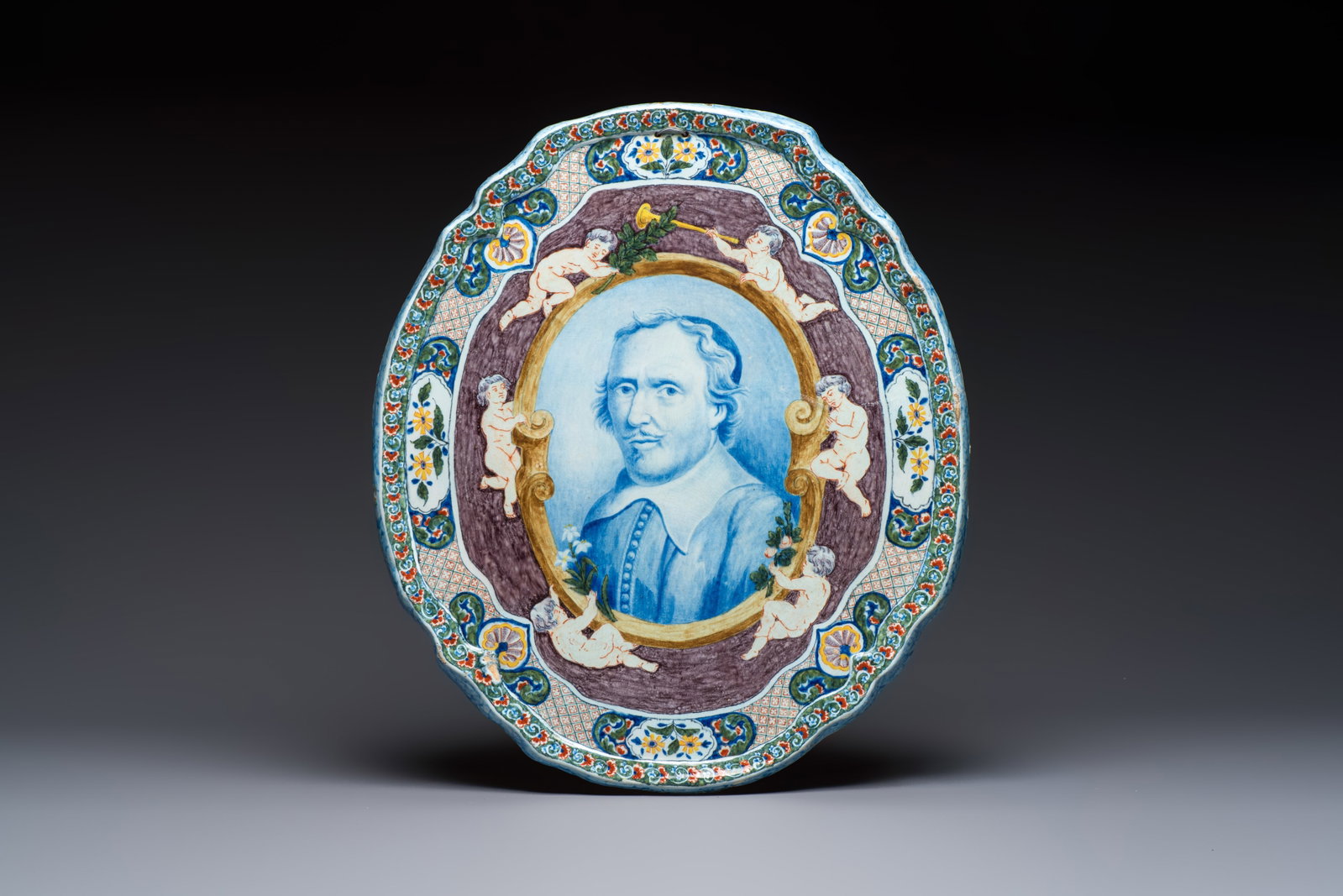 A polychrome Dutch Delft 'Portrait' plaque, 19th C. (1 of 2)