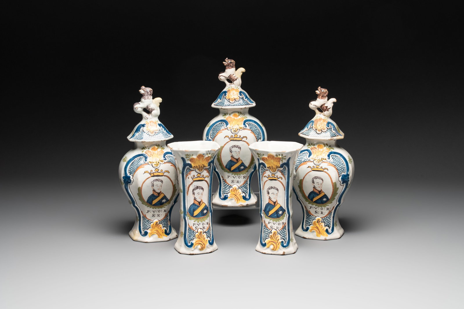A polychrome Dutch Delft five-piece garniture with the portrait of William I of The Netherlands, (1 of 15)