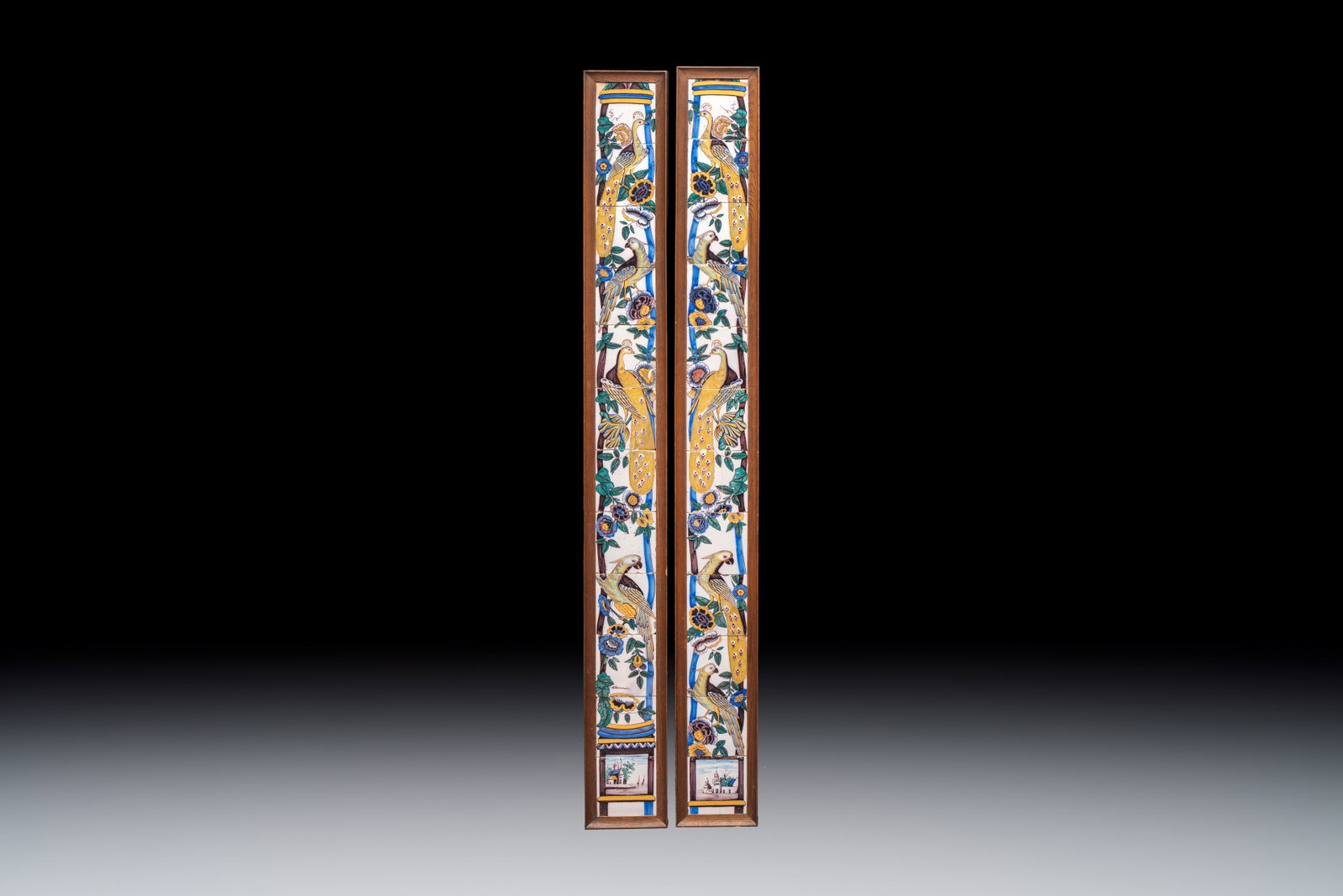 A pair of polychrome Dutch Delft tile murals or 'pillars' with peacocks on columns, 18th C. (1 of 2)