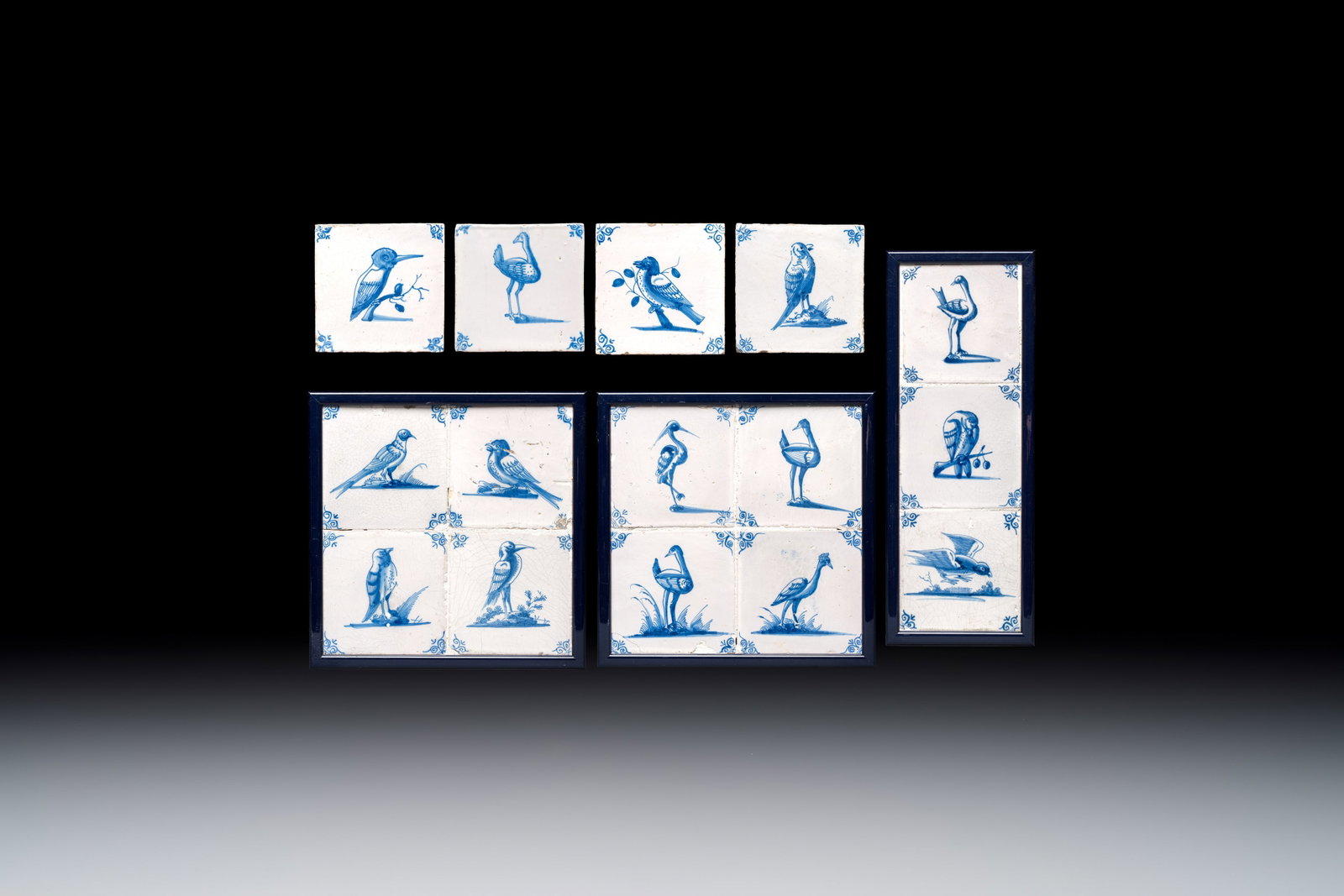 15 blue and white Dutch Delft tiles with large birds, 17th C.: 15 blue and white Dutch Delft tiles with large birds, 17th C. Dim.: ca. 28,3 x 28,3 cm (the largest frame) Dim.: ca. 12,5x12,5 x 0,9 cm (each tile)