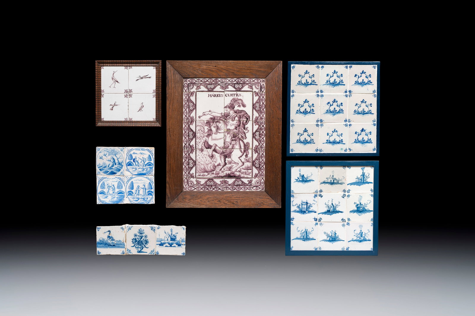 Six blue, white and manganese Dutch Delft tile panels, 18th C.: Six blue, white and manganese Dutch Delft tile panels, 18th C. Dim.: ca. 53 x 66 cm (the 'Markus Curtius' panel, the frame) Dim.: ca. 5,9 x 6,3 cm (each corner tile of the 'Markus Curtius' panel) Dim.