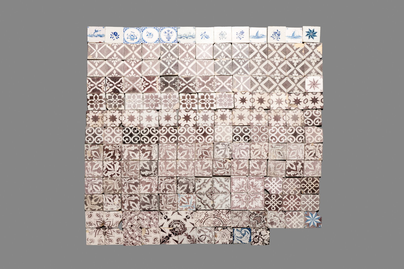 166 blue, white and manganese Dutch Delft tiles, 18th C.: 166 blue, white and manganese Dutch Delft tiles, 18th C. Dim.: ca. 13,2 x 13 x 0,7 cm (each tile)
