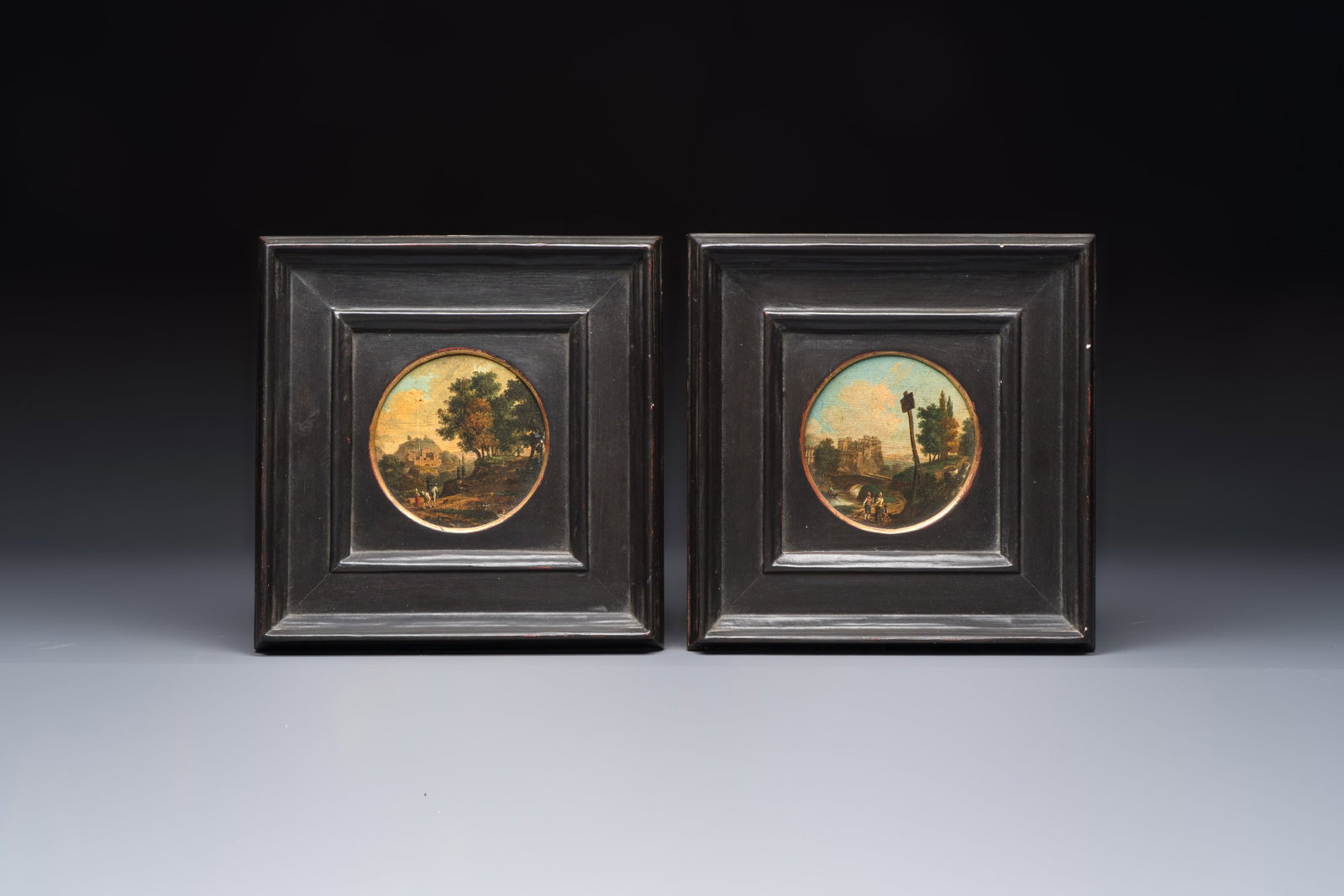 German School: a pair of 'Landscapes with Travellers', oil on paper mounted on board, 18th C. (1 of 2)
