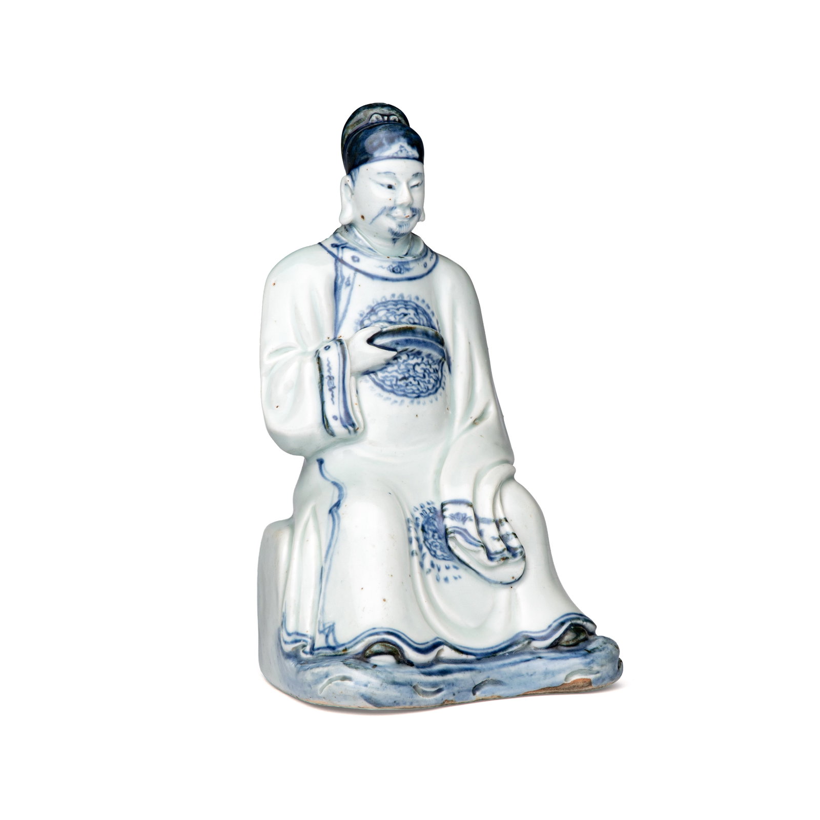 A Chinese blue and white seated figure of Wenchang, Wanli: A Chinese blue and white seated figure of Wenchang, Wanli H.: 22,4 cm Provenance: - Marc Michot, Bruges. - The Mr. and Mrs. Baert-Devos Collection, Belgium. Acquired from the above in 2000, accompanie