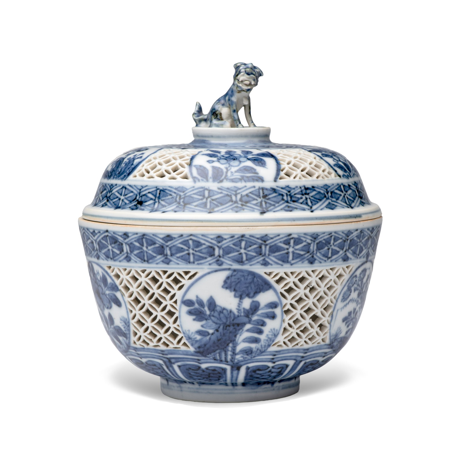 A Chinese blue and white reticulated 'Linglong' bowl and cover, Transitional period: A Chinese blue and white reticulated 'Linglong' bowl and cover, Transitional period Dia.: 11,3 cm - H.: 12,1 cm | incl. cover Provenance: - Vanderven Oriental Art, 's Hertogenbosch, with their label. 