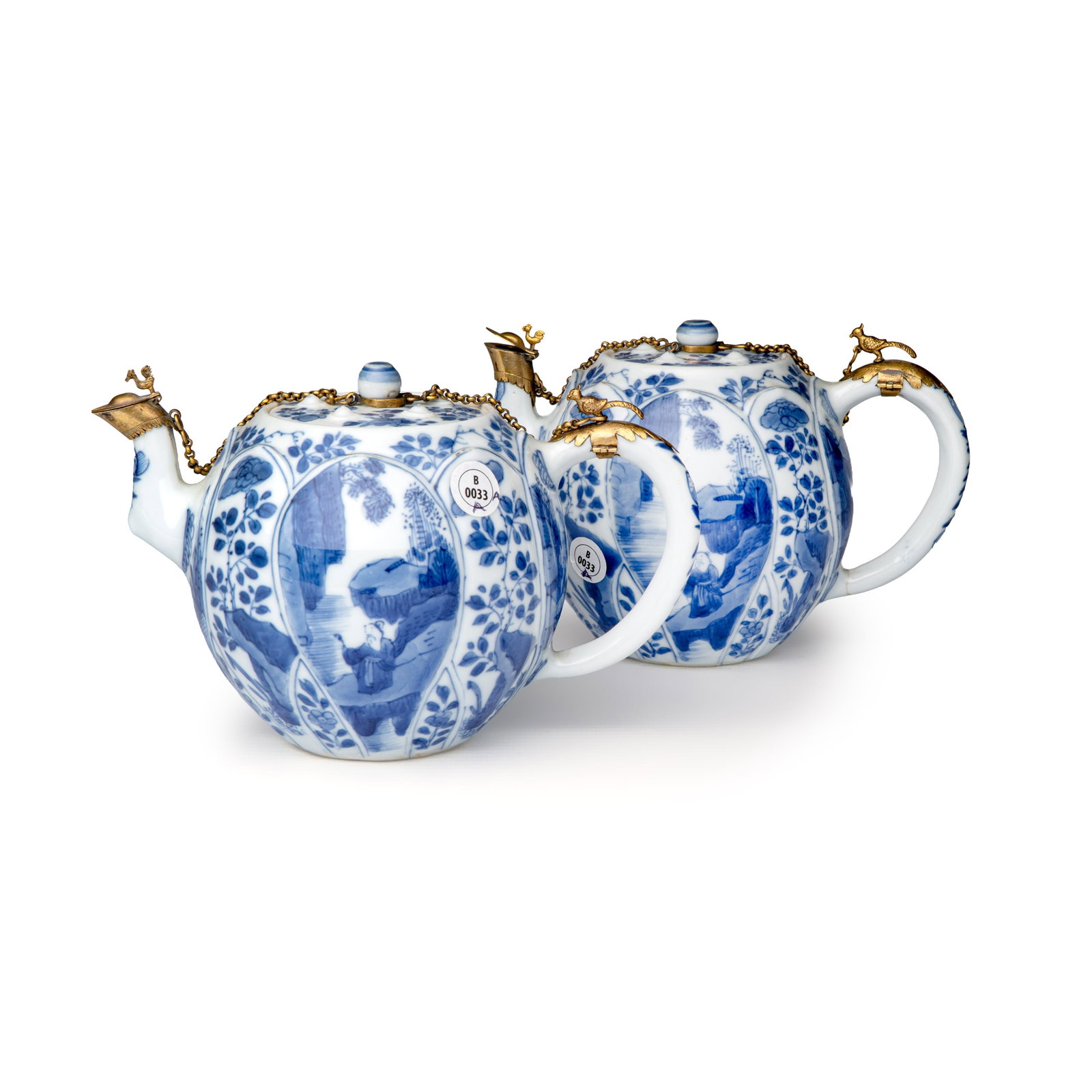 A pair of Chinese blue and white lotus-shaped teapots with mounts, Kangxi (1 of 14)