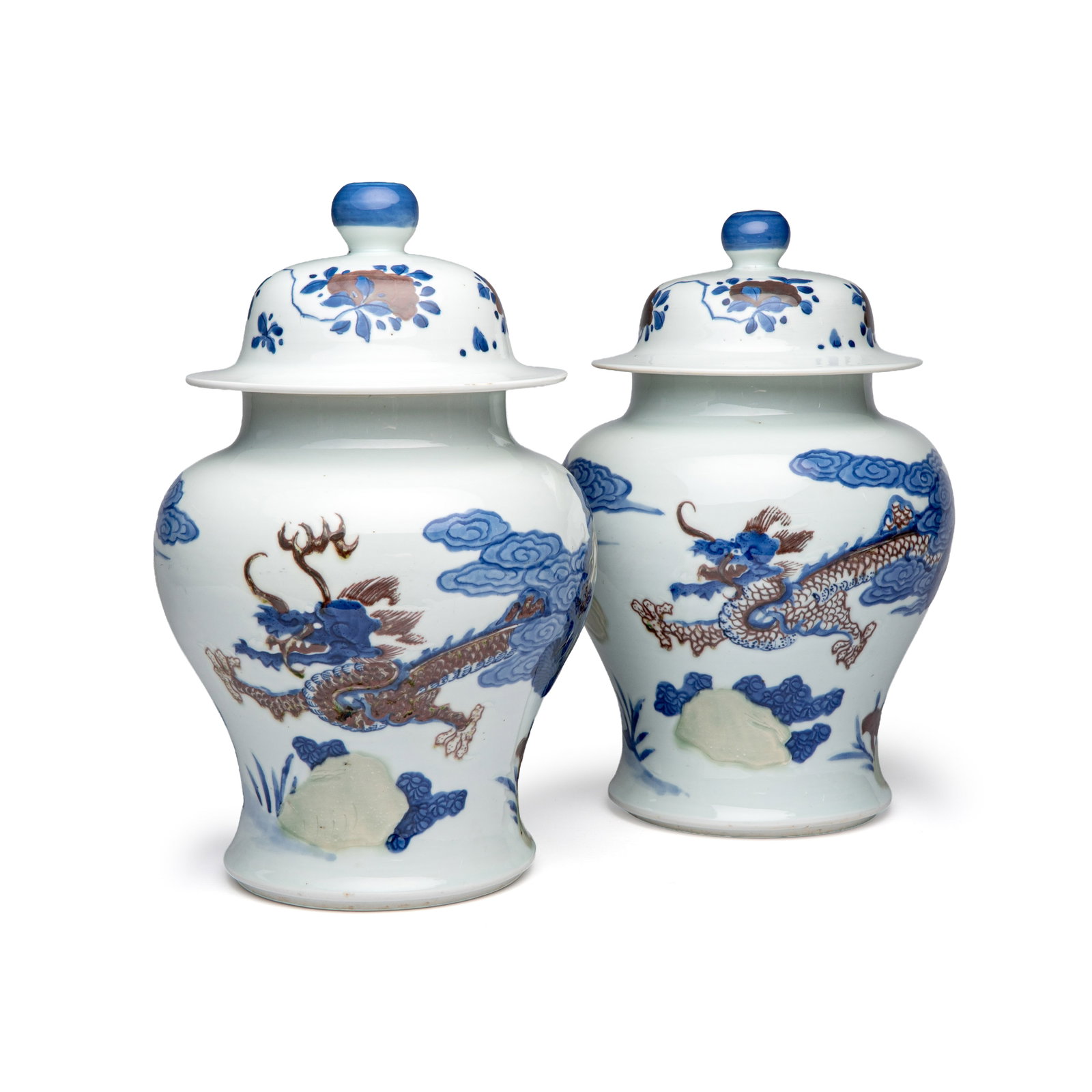 A pair of Chinese underglaze-blue, copper-red and celadon-glazed 'Dragon and Tiger' vases and (1 of 17)