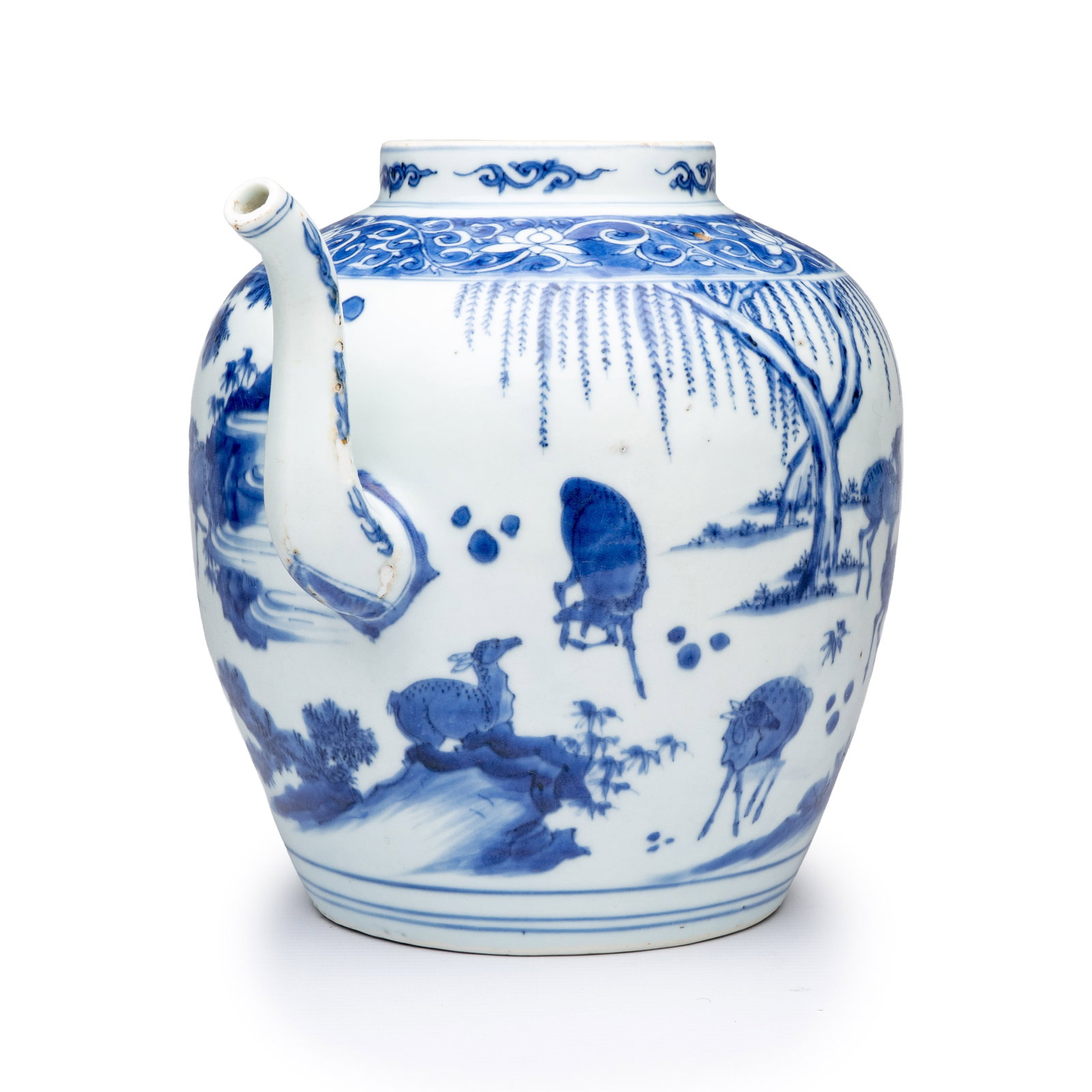 An unusual Chinese blue and white 'Deer' ewer, Transitional period: An unusual Chinese blue and white 'Deer' ewer, Transitional period L.: 24,5 cm - H.: 20,9 cm Provenance: - Luis Alegria, Porto, with their label to the base. - The Mr. and Mrs. Baert-Devos Collection,