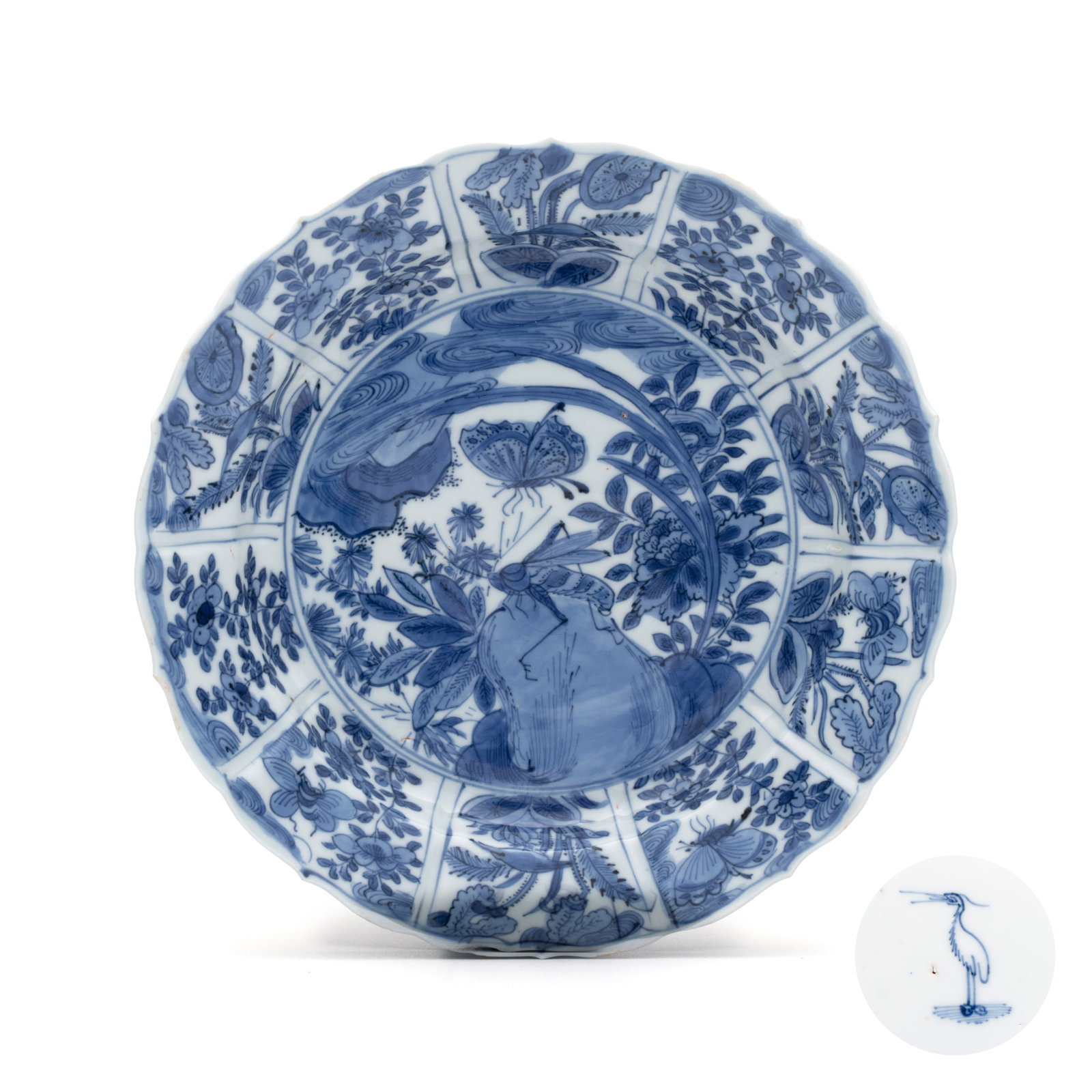A Chinese blue and white 'Grasshopper and Butterfly' plate, Egret mark, Wanli: A Chinese blue and white 'Grasshopper and Butterfly' plate, Egret mark, Wanli Dia.: 20,3 cm Provenance: - Marc Michot, Bruges. - The Mr. and Mrs. Baert-Devos Collection, Belgium. Acquired from the abo