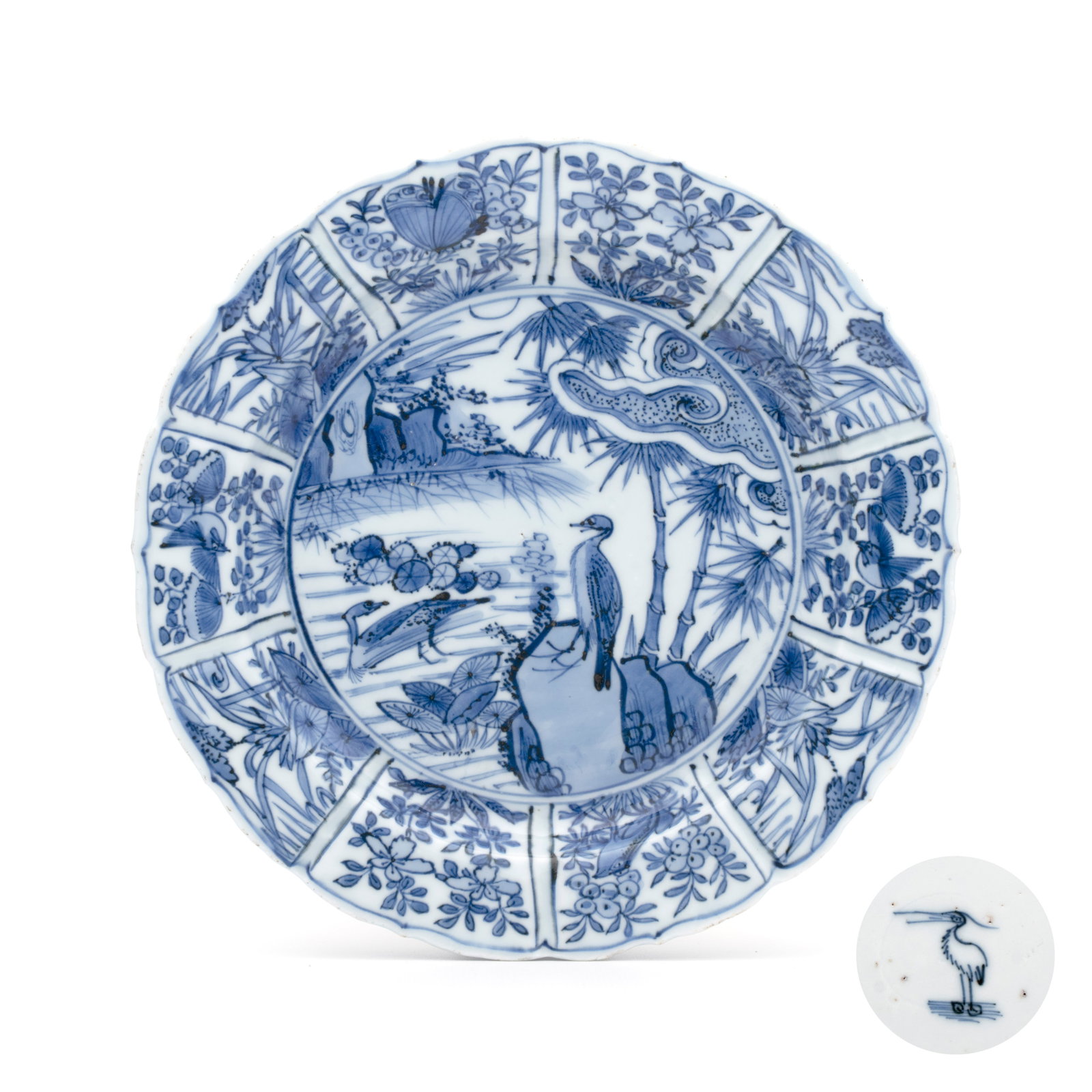 A Chinese blue and white 'Birds Beside the Water' plate, Egret mark, Wanli: A Chinese blue and white 'Birds Beside the Water' plate, Egret mark, Wanli Dia.: 21 cm Provenance: - Marc Michot, Bruges. - The Mr. and Mrs. Baert-Devos Collection, Belgium. Acquired from the above on