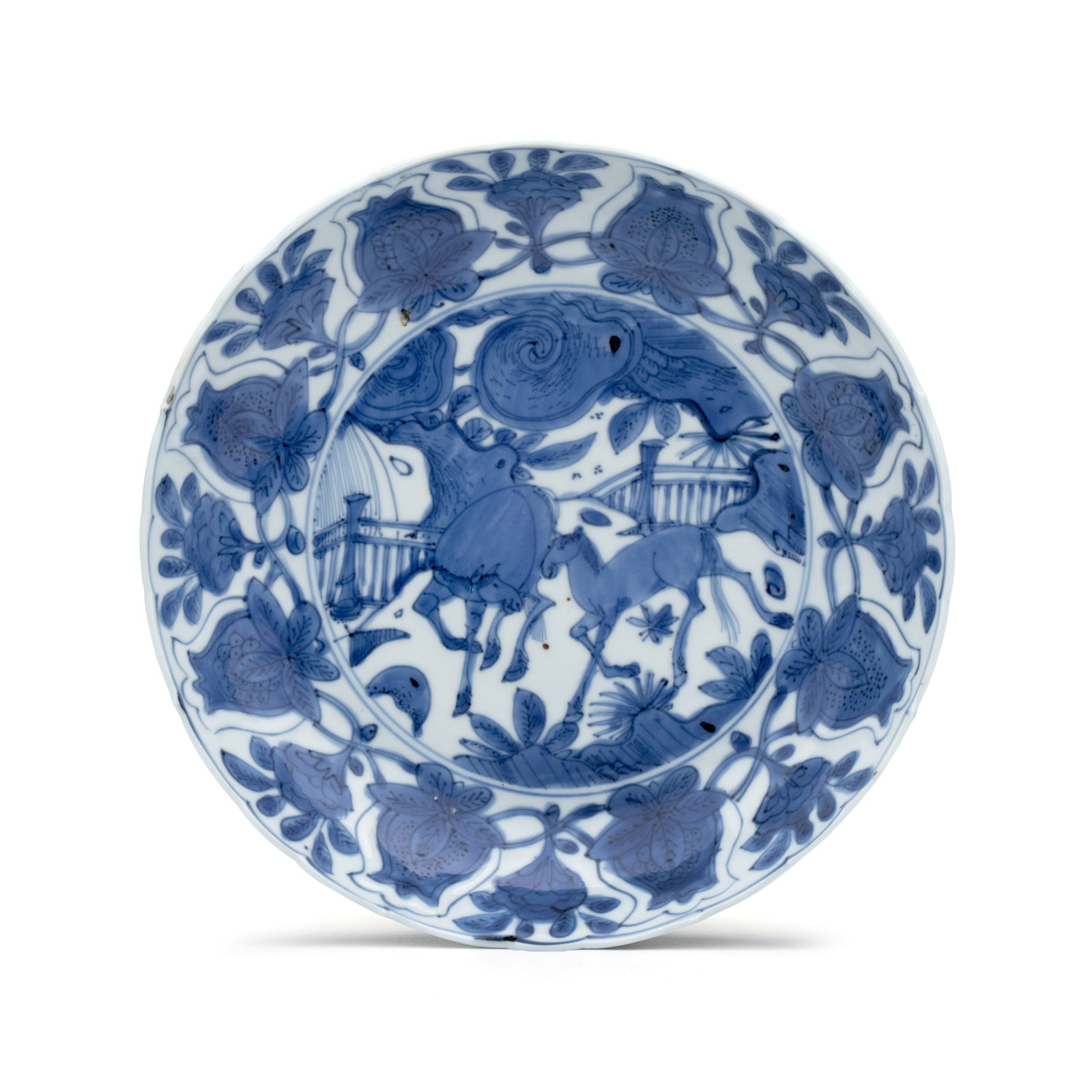 A Chinese blue and white 'Horses' plate, Wanli (1 of 3)