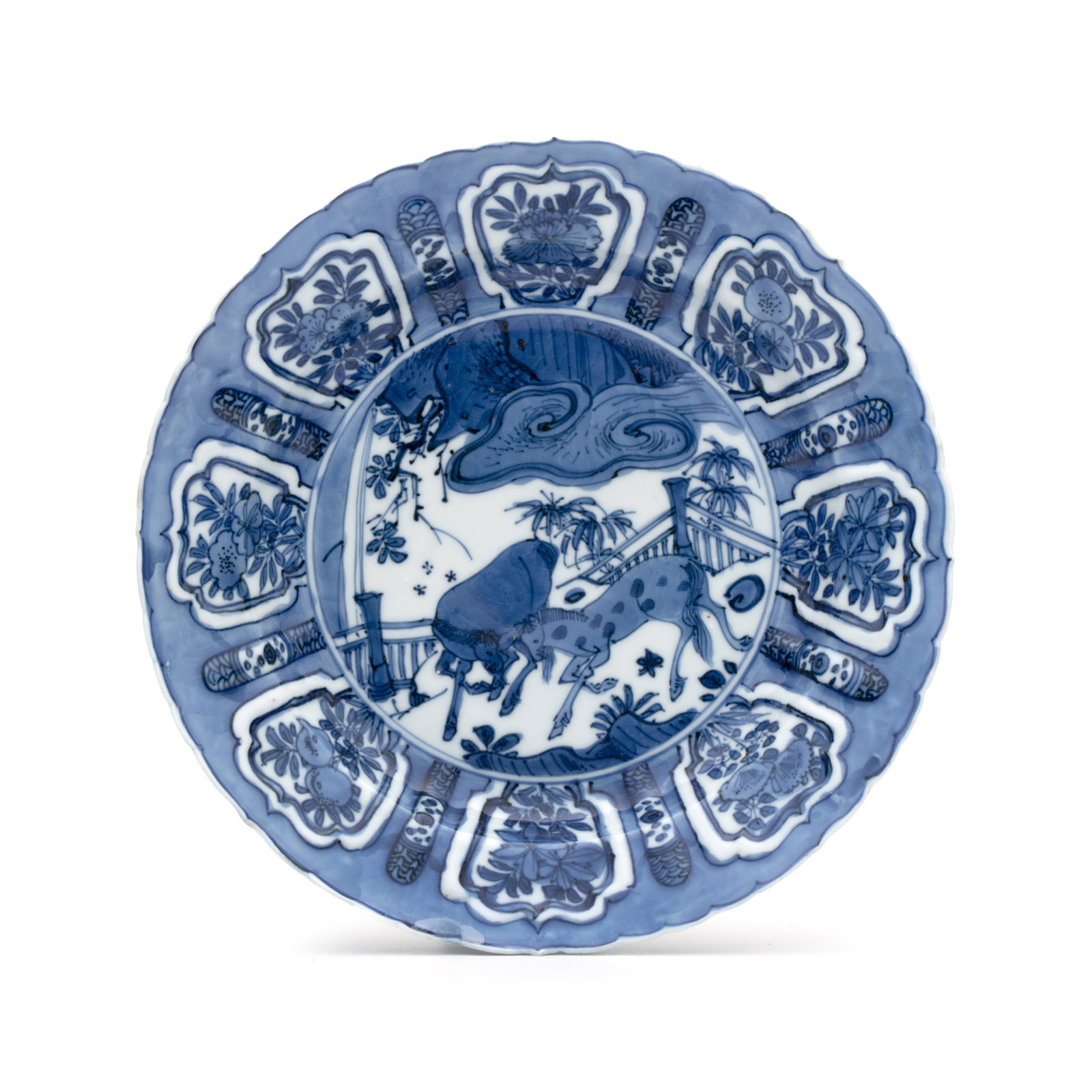 A Chinese blue and white 'Horses' plate, Wanli: A Chinese blue and white 'Horses' plate, Wanli Dia.: 20,5 cm Provenance: - Rob Michiels Auctions, Bruges, 24 June 2017, lot 1001. (sold EUR 1.300,00) - The Mr. and Mrs. Baert-Devos Collection, Belgium