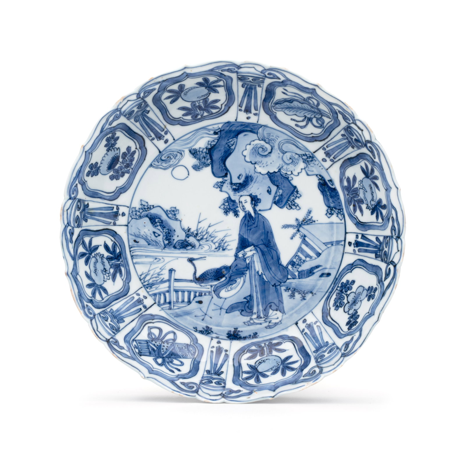A Chinese blue and white 'Sage and Crane' plate, Wanli: A Chinese blue and white 'Sage and Crane' plate, Wanli Dia.: 20,5 cm Provenance: - Marc Michot, Bruges. - The Mr. and Mrs. Baert-Devos Collection, Belgium. Acquired from the above in 1990 and accompan