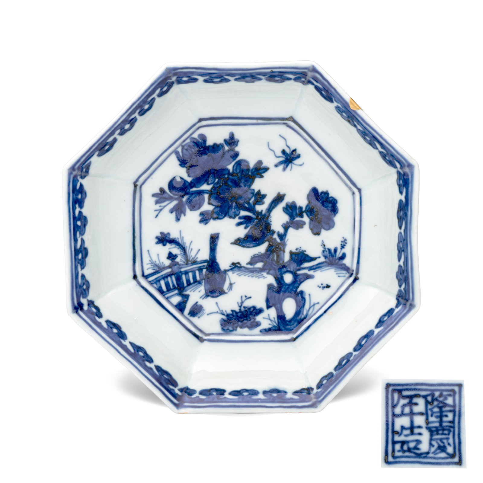 A Chinese blue and white 'Magpies among Peony' octagonal plate, Longqing mark and of the period: A Chinese blue and white 'Magpies among Peony' octagonal plate, Longqing mark and of the period Dia.: 14,1 cm Provenance: - S. Marchant and Son, London, with their label to the reverse. - The Mr. and 
