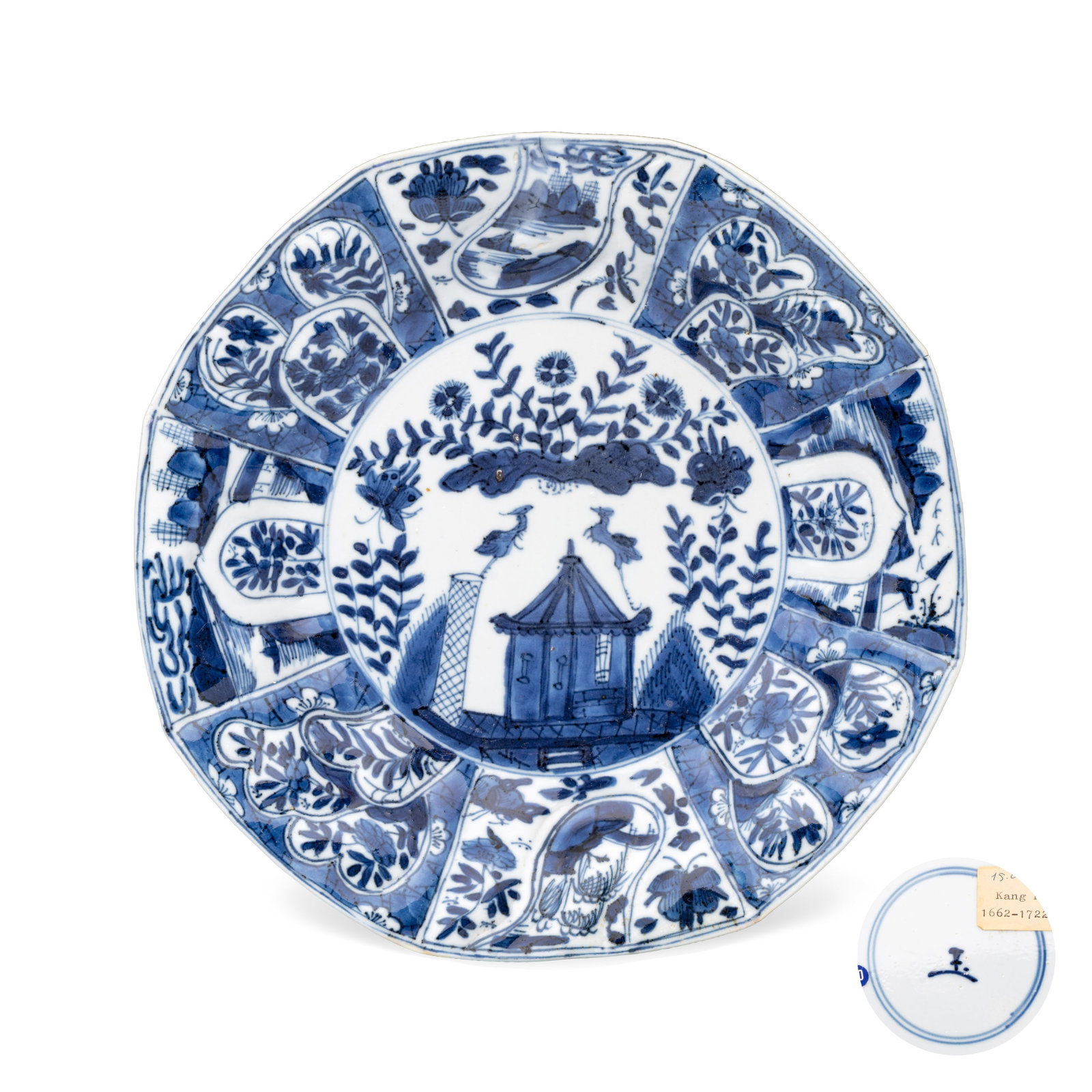 A Chinese blue and white 'Cuckoo in the House' plate, jade mark, Kangxi: A Chinese blue and white 'Cuckoo in the House' plate, jade mark, Kangxi Dia.: 20,7 cm Provenance: The Mr. and Mrs. Baert-Devos Collection, Belgium. Acquired from Dufromont in 1990, according to the ow