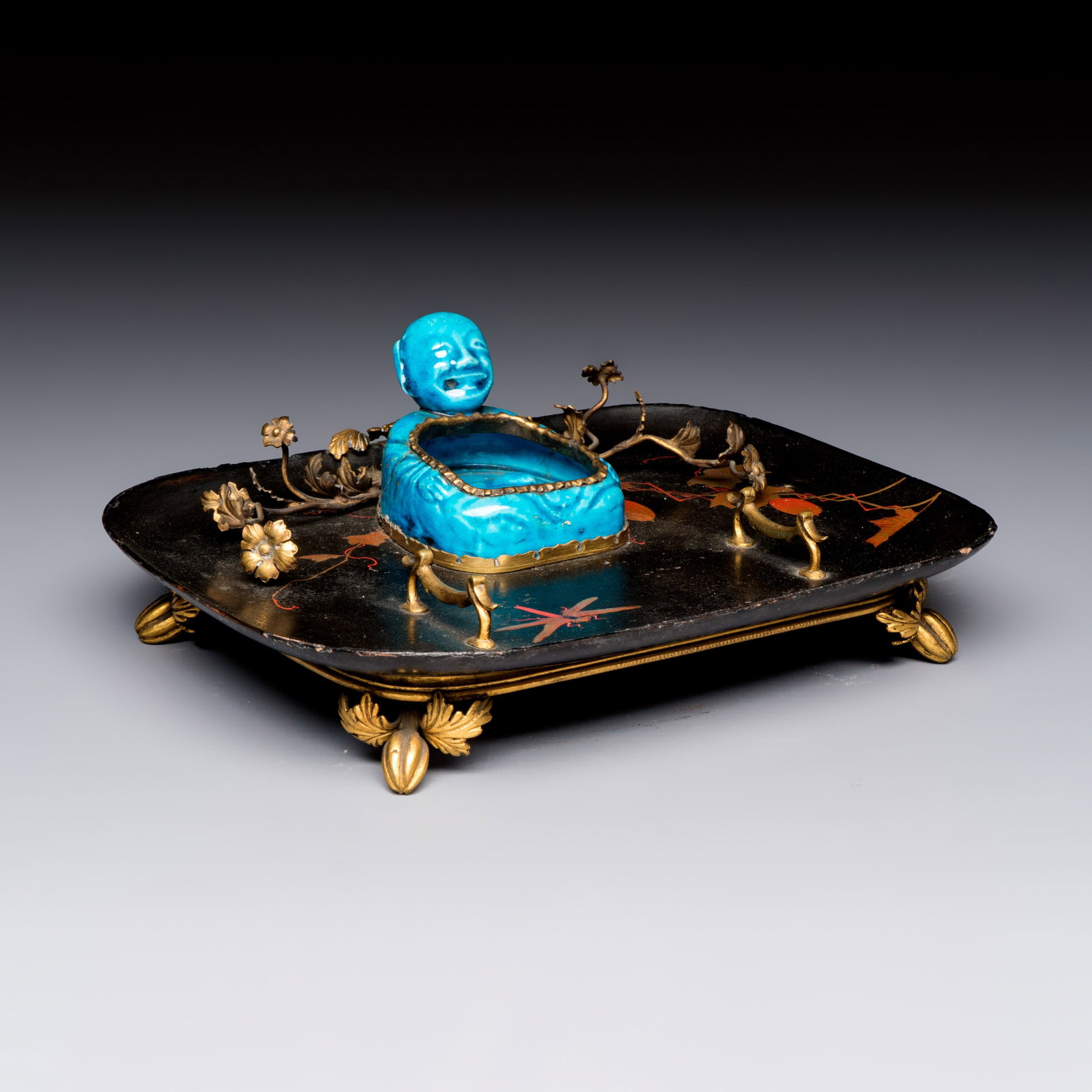 A French lacquered and gilt-bronze-mounted inkwell with a Chinese turquoise-glazed Buddha, Kangxi: A French lacquered and gilt-bronze-mounted inkwell with a Chinese turquoise-glazed Buddha, Kangxi and later Dim: 18,6 x 16,1 x 7,2 cm