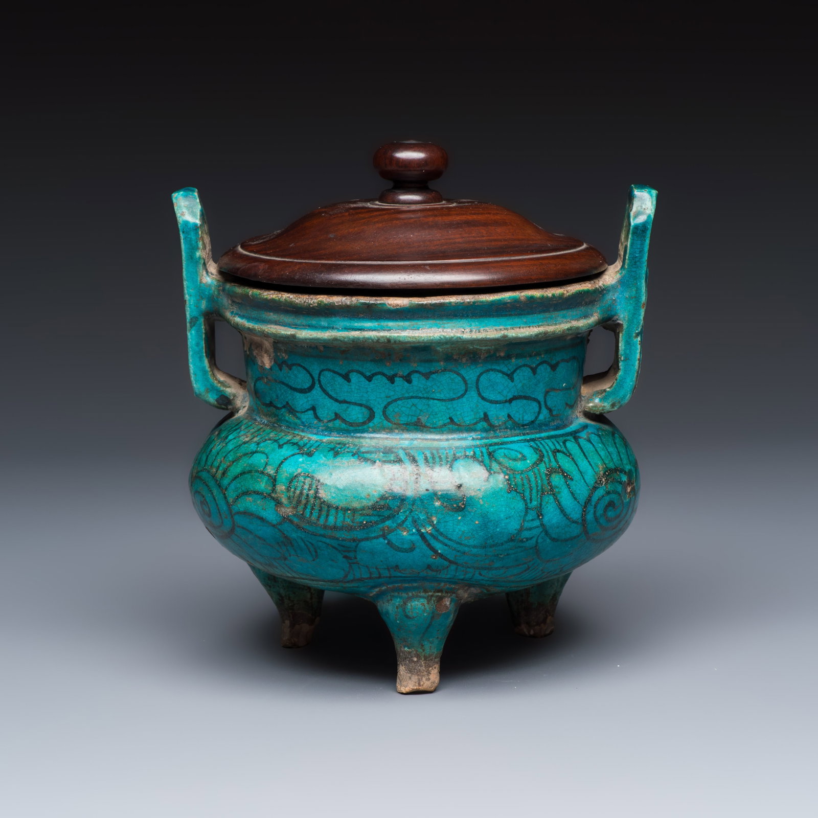 A Chinese peacock-blue-glazed tripod incense burner with wooden cover, Ming (1 of 10)