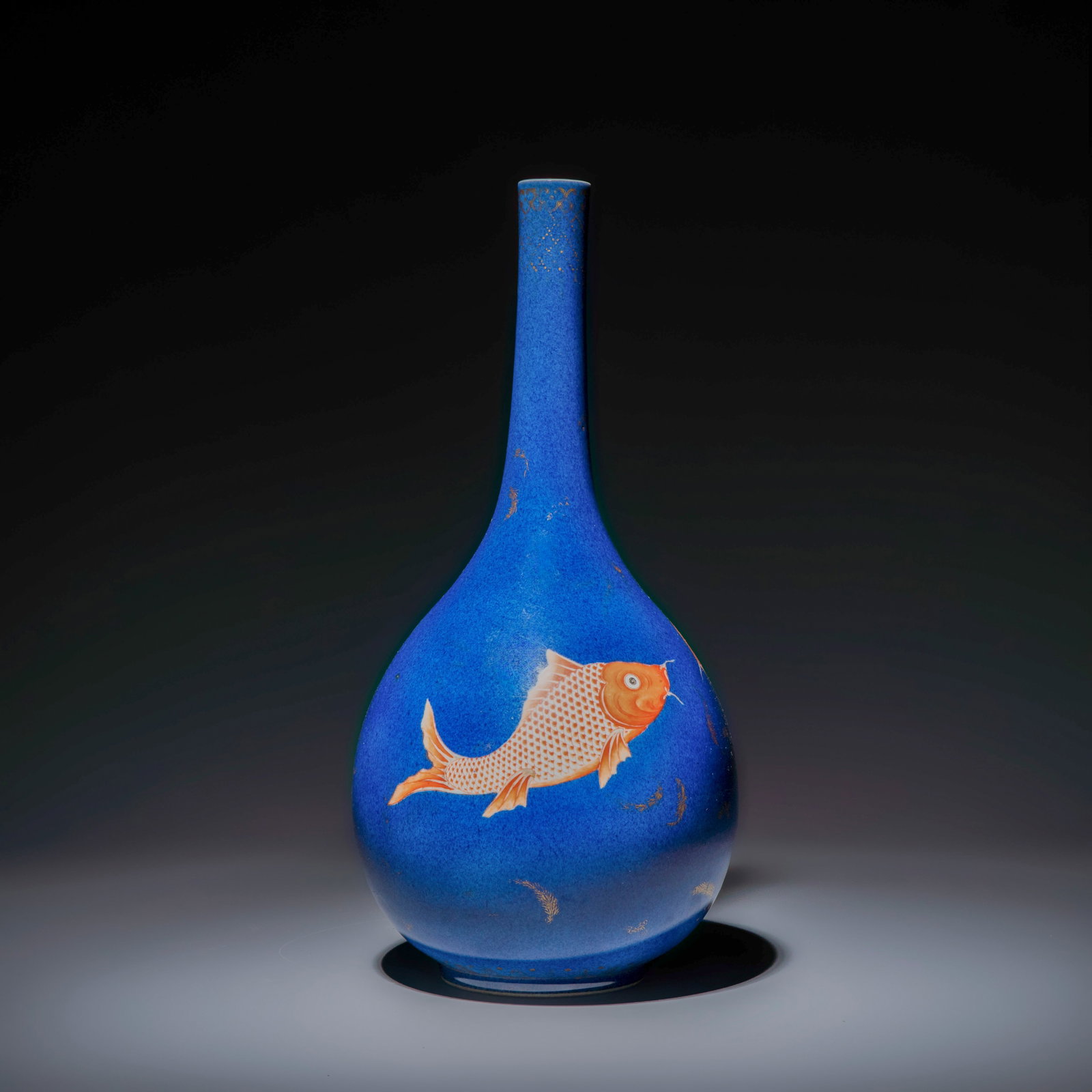 A Chinese gilt-heightened powder-blue-ground iron-red decorated 'Carps' vase, 19th C.: A Chinese gilt-heightened powder-blue-ground iron-red decorated 'Carps' vase, 19th C. H.: 45,2 cm Provenance: The collection of Raoul Malard (1928-2015), a northern French textile baron from the Tourc