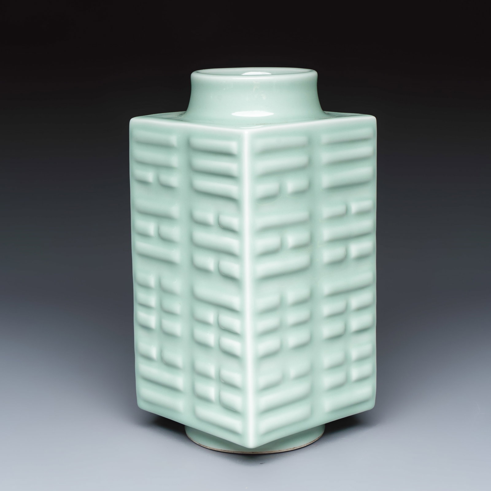 A Chinese celadon-glazed 'Bagua' cong vase, Guangxu mark and possibly of the period (1 of 7)