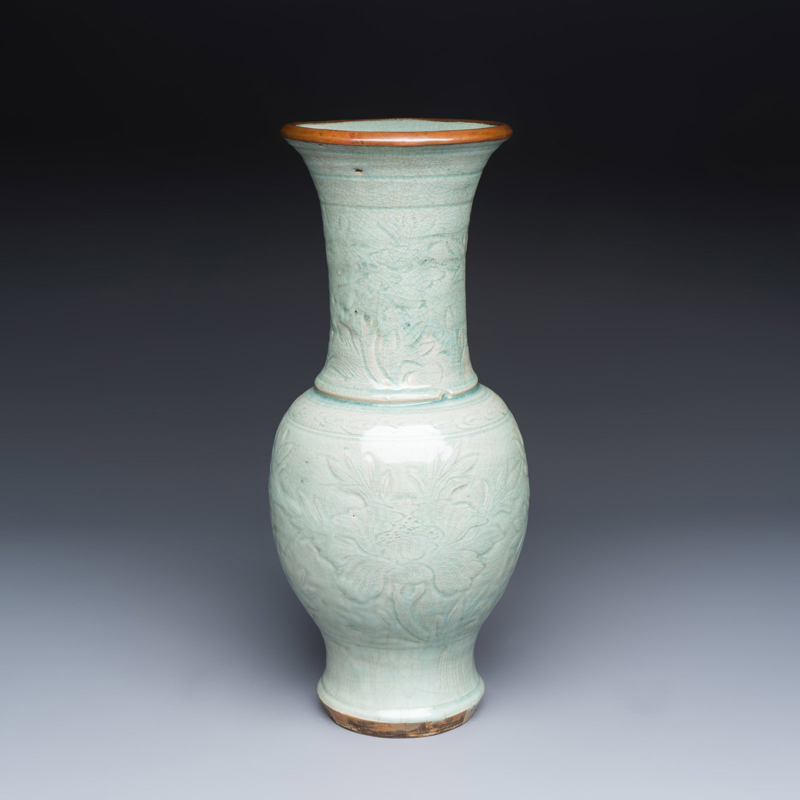 A Chinese Longquan celadon-glazed incised 'Peony' yenyen vase, Yuan/Ming (1 of 7)