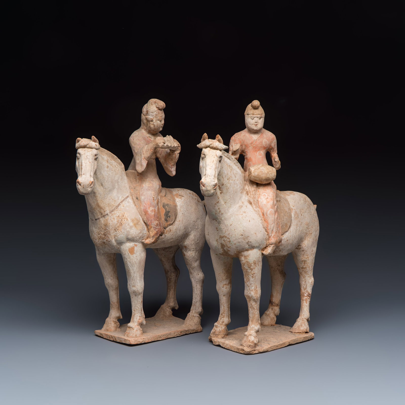 Two Chinese painted pottery 'Horserider' groups, Tang: Two Chinese painted pottery 'Horserider' groups, Tang Dim: 30 x 10,5 x 34 cm Provenance: Blue Elephant Art and Antique, Maastricht, The Netherlands. Accompanied by their certificate of authenticity an