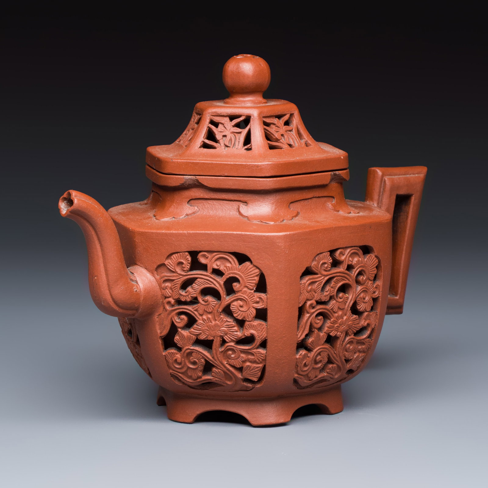 A Chinese Yixing stoneware openworked double-walled teapot and cover with floral design, Kangxi (1 of 7)