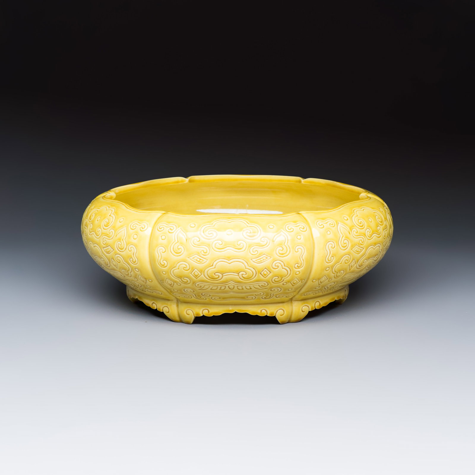 A Chinese yellow-glazed brush washer, Guangxu mark, 20th C. (1 of 7)