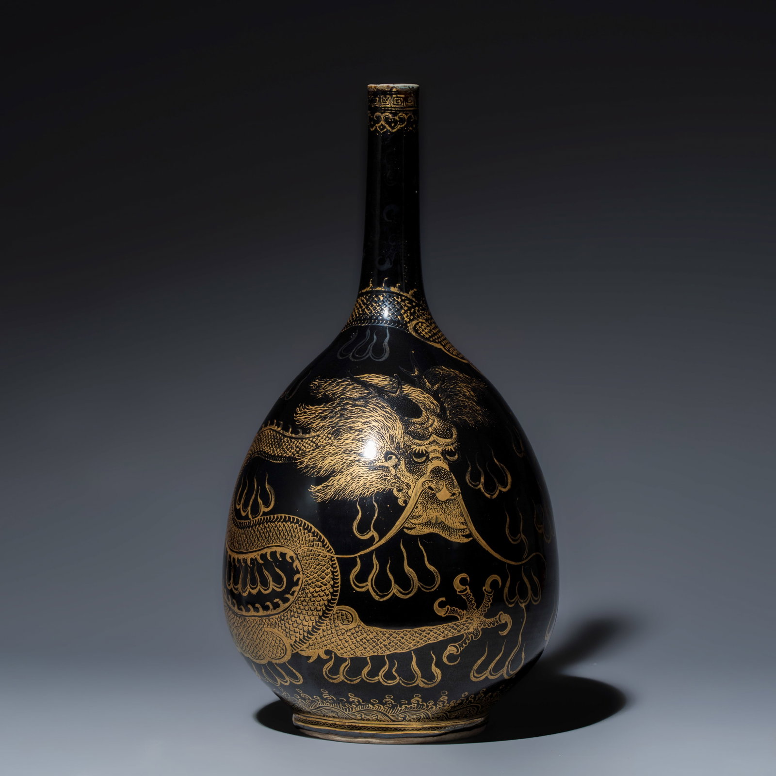 A Chinese gilt-decorated black-ground 'Dragon' vase, Qianlong mark, 19th C. (1 of 6)