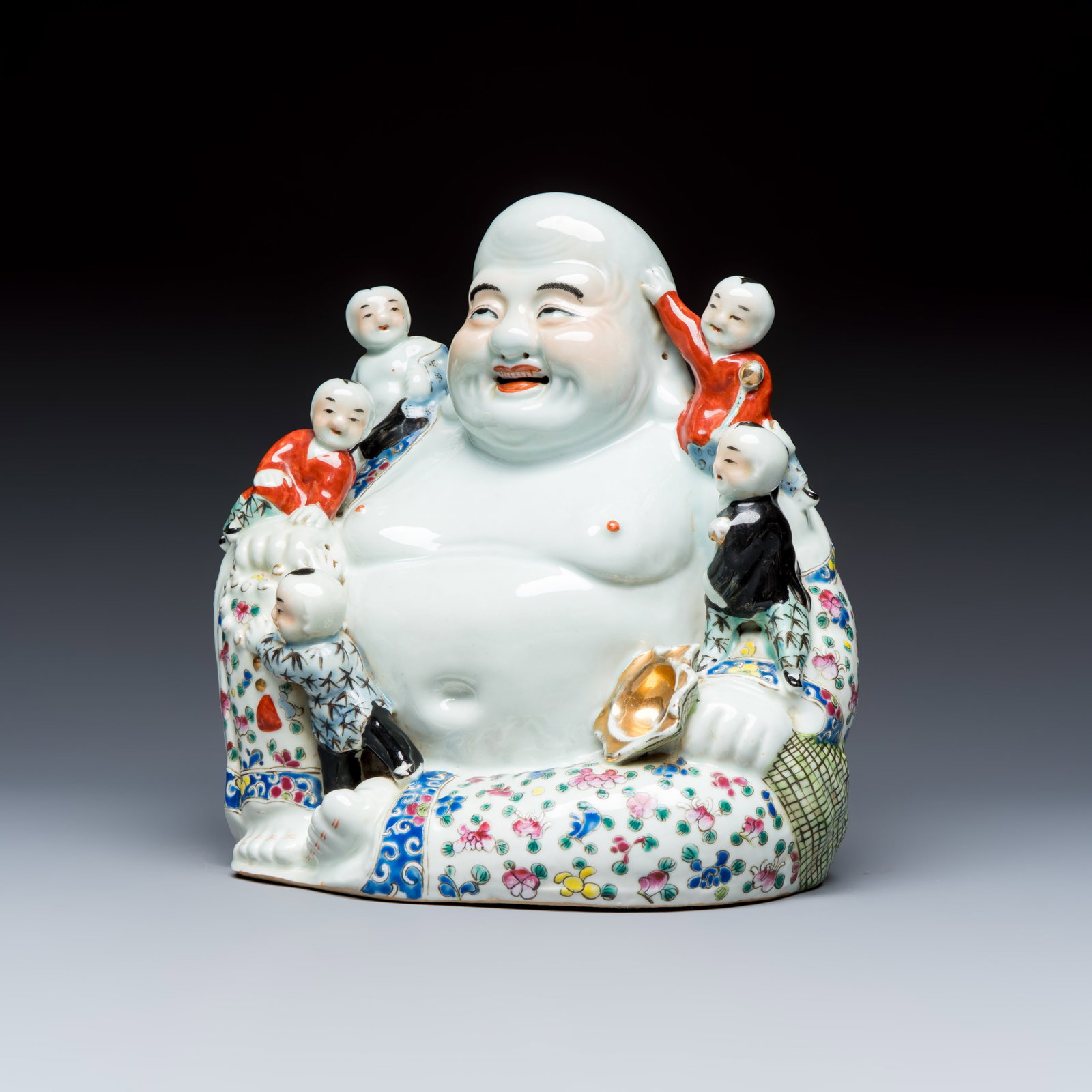 A Chinese famille rose Milefo Buddha with playing boys, Zhu Mao Sheng mark, Republic: A Chinese famille rose Milefo Buddha with playing boys, Zhu Mao Sheng mark, Republic Dim: 24,6 x 16,6 x 26,8 cm