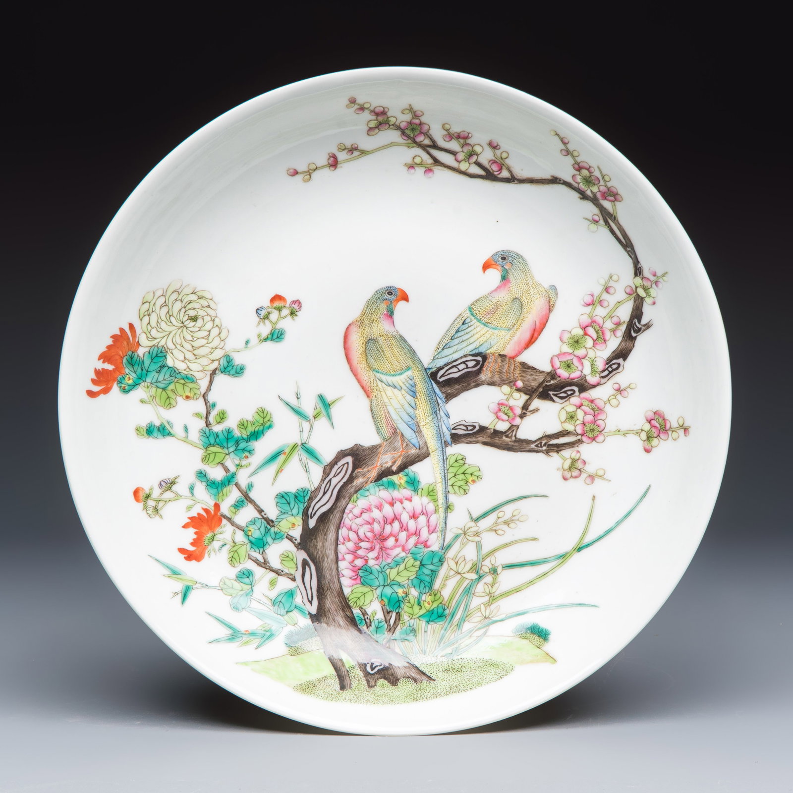 A fine Chinese famille rose 'Pair of Birds among Flowering Branches' plate, Guangxu mark, Republic: A fine Chinese famille rose 'Pair of Birds among Flowering Branches' plate, Guangxu mark, Republic Dia.: 23,9 cm Provenance: A Dutch private collection.