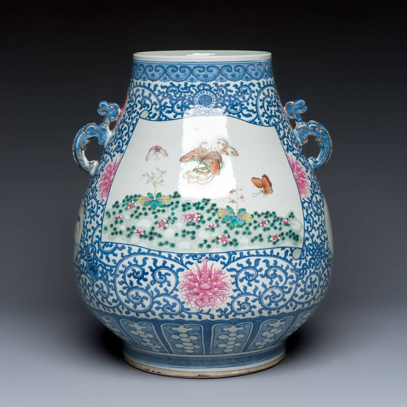 A large Chinese famille rose 'Hu' vase with birds and butterflies, Qianlong mark, 19th C.: A large Chinese famille rose 'Hu' vase with birds and butterflies, Qianlong mark, 19th C. H.: 45 cm